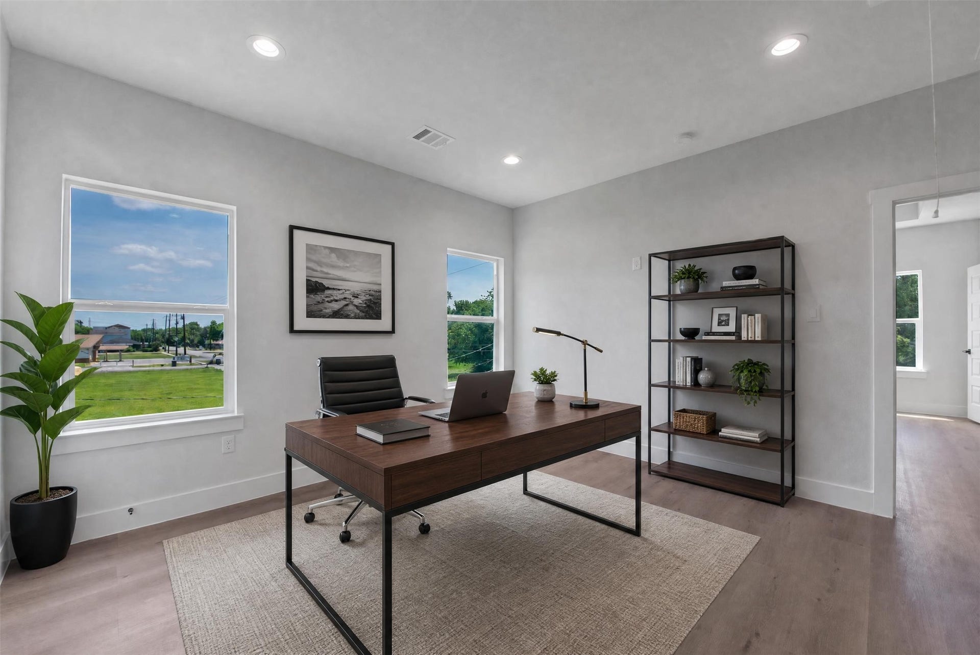 Light and bright, this versatile flex space on the second floor is currently shown as a home office but offers endless possibilities to suit your lifestyle. Use it as a study, creative space, playroom, workout area, or what fits your needs.