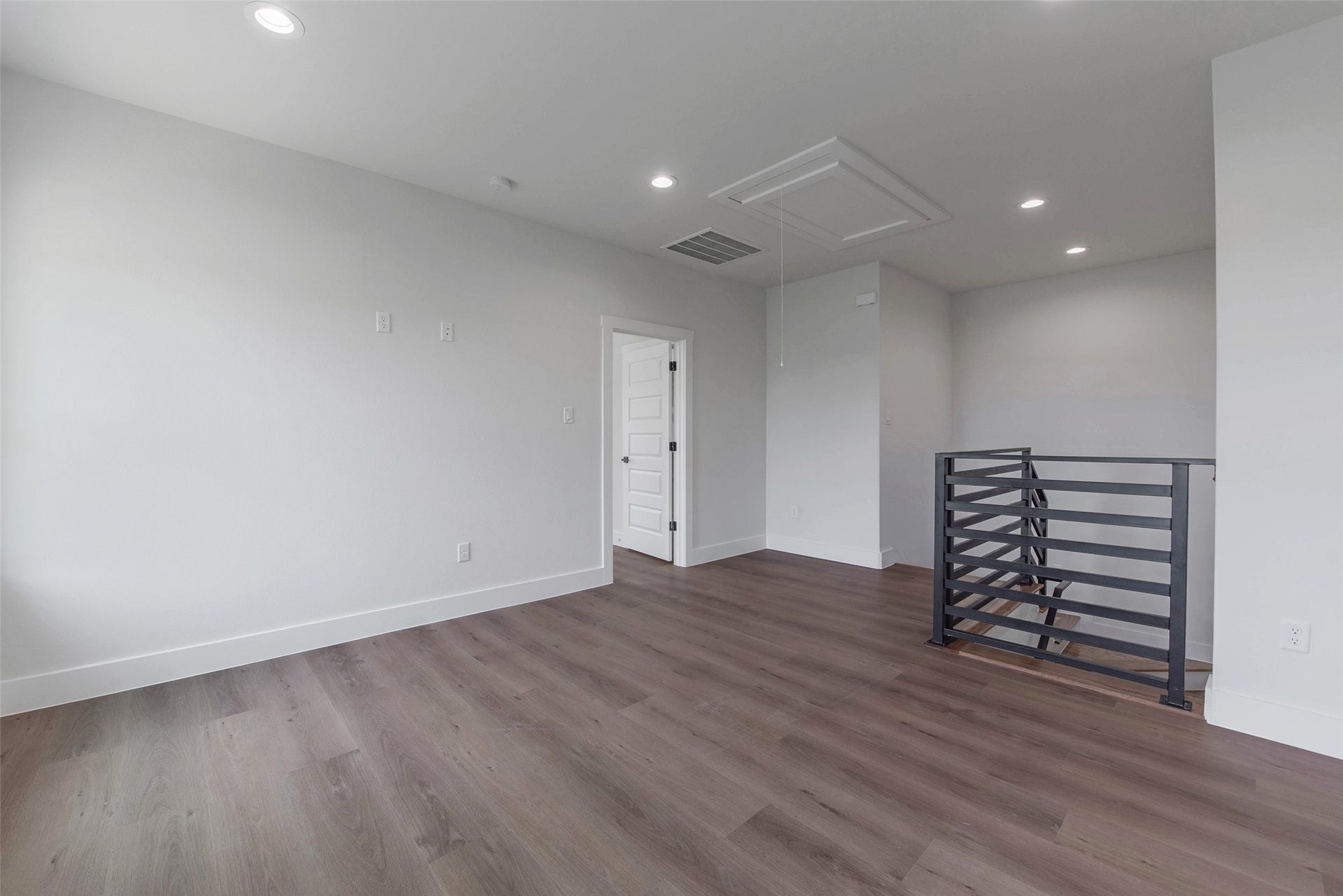 A versatile flex space serves as a second family room, home office, gym, or play area, offering endless possibilities to suit your lifestyle.