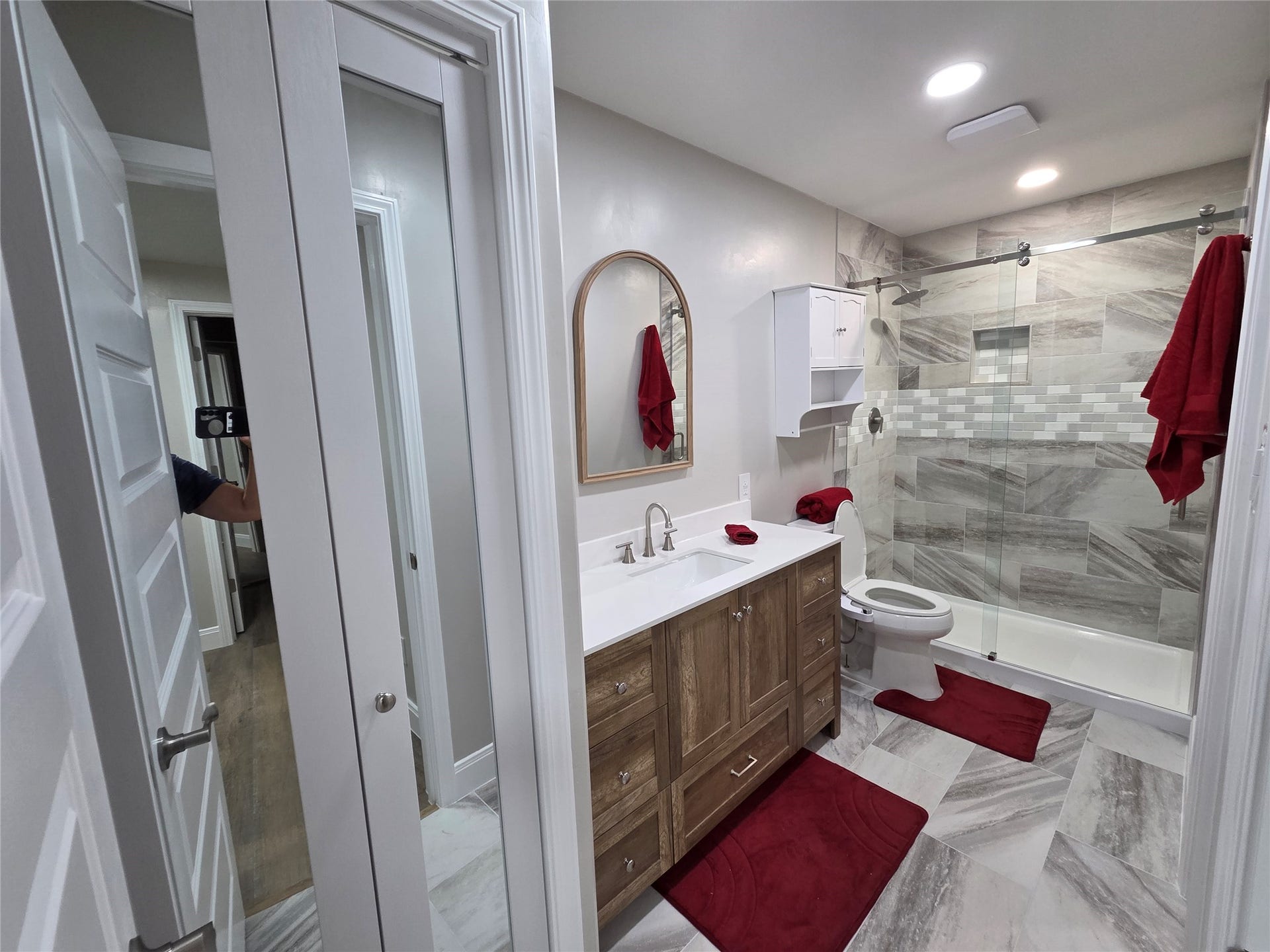 2475 Underwood Street, #166, Houston, TX 77030 The bathroom offers procelin tile, frameless walkin shower, mirror linen closet door, bidet a vanity with extra storage space, recess lighting and ac vent and fan!