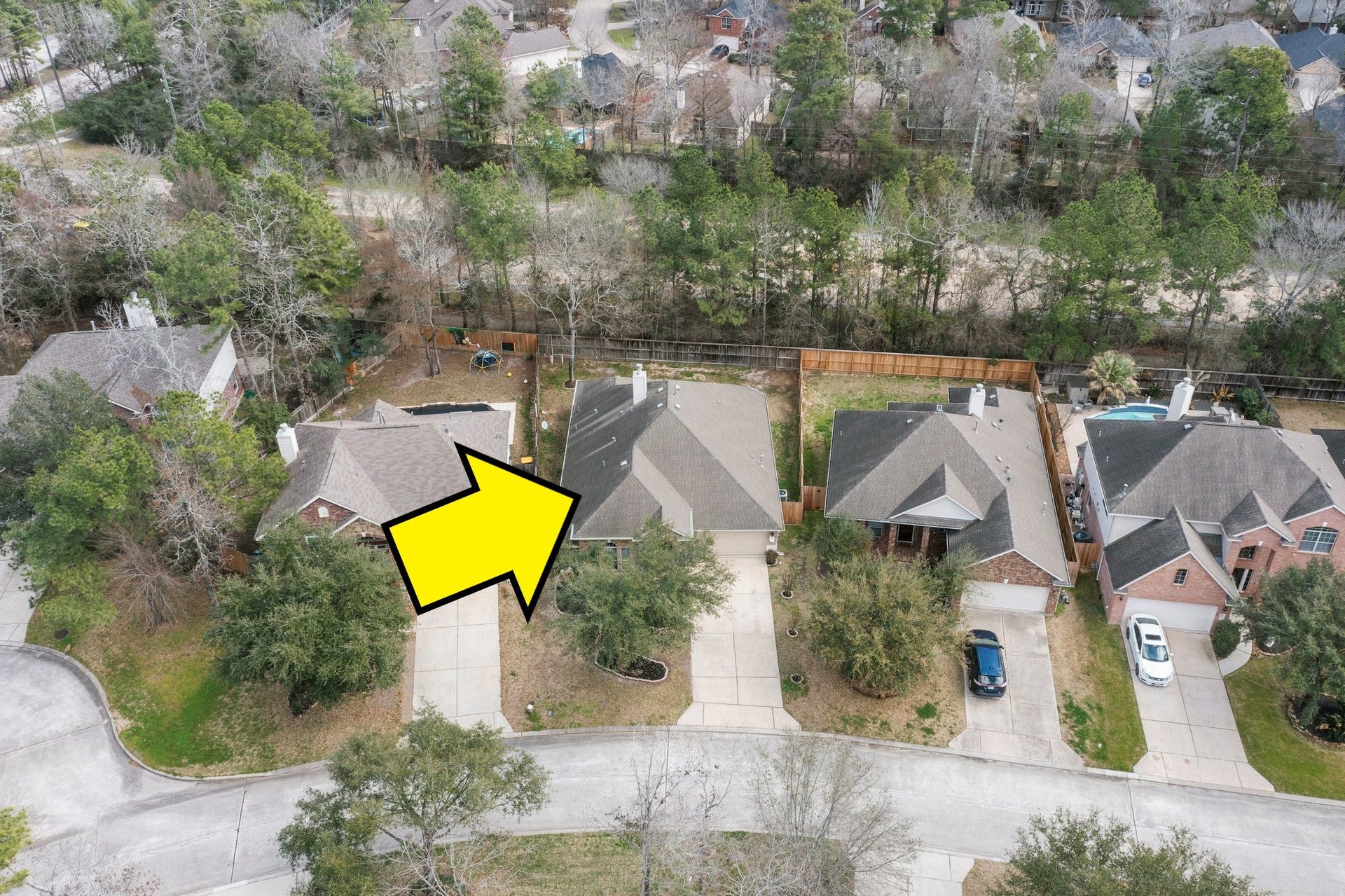 34 Bryce Branch Circle, The Woodlands, TX 77382 Home backs to a greenbelt for privacy.