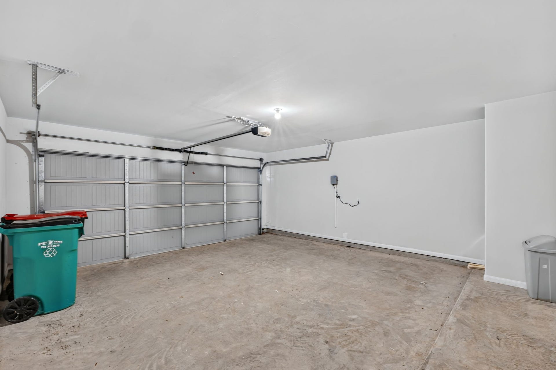 5243 Shallowhurst Lane, Katy, TX 77449 An attached two-car garage with an automatic door opener and plenty of room for storage.