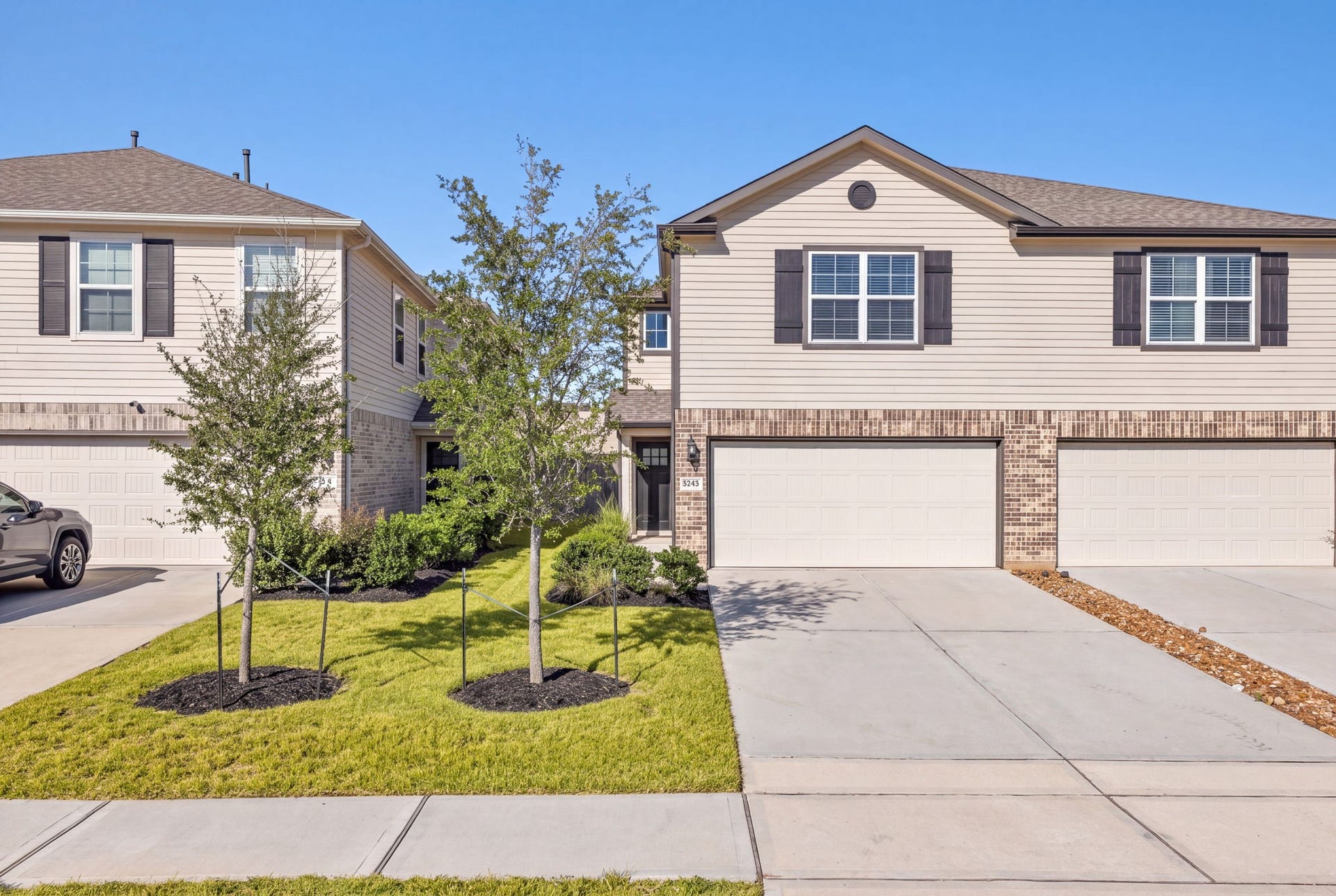 5243 Shallowhurst Lane, Katy, TX 77449 Curb appeal on Shallowhurst Ln with a private double wide driveway and sidewalk
