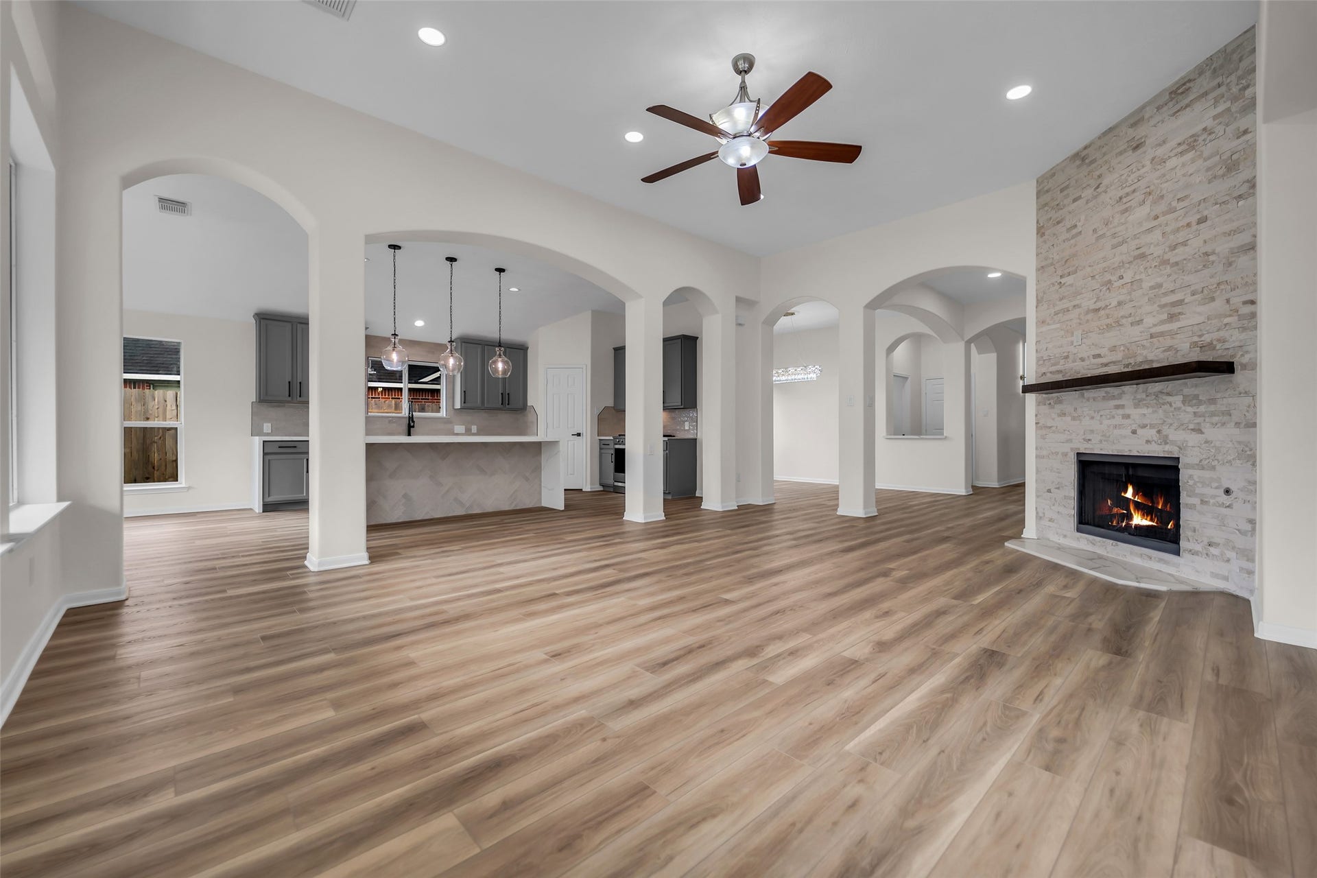 3906 Inglewood Circle, Missouri City, TX 77459 The stone from floor to ceiling on the fireplace really elevates the space and sets the tone for relaxing and reconnecting in this amazing home.