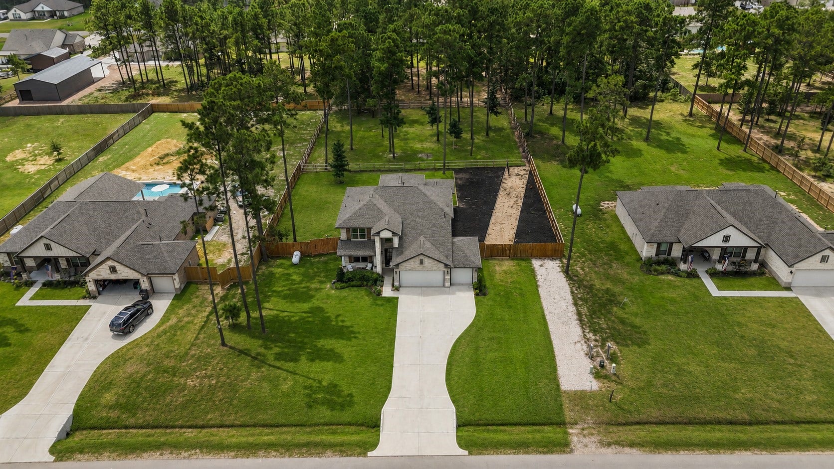 13432 Maverick Trail Road, Conroe, TX 77303 Notice the two sections of the backyard separately fenced