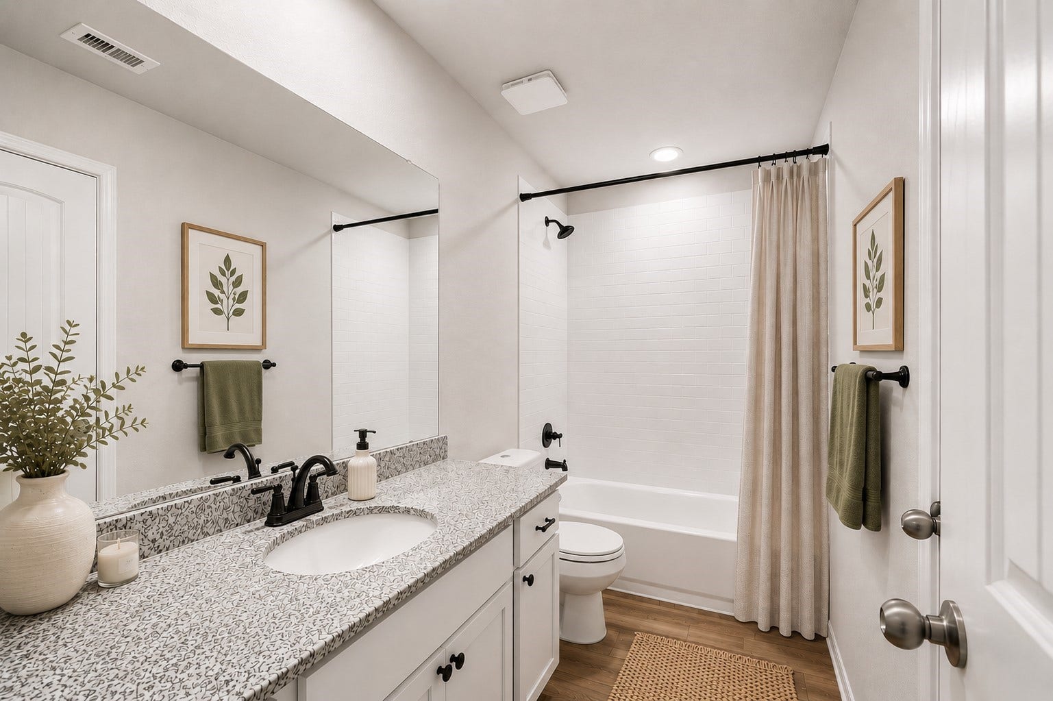 13432 Maverick Trail Road, Conroe, TX 77303 Full bathroom on the 2nd level with a sleek granite countertop, modern fixtures, and a cozy tub-shower combo.