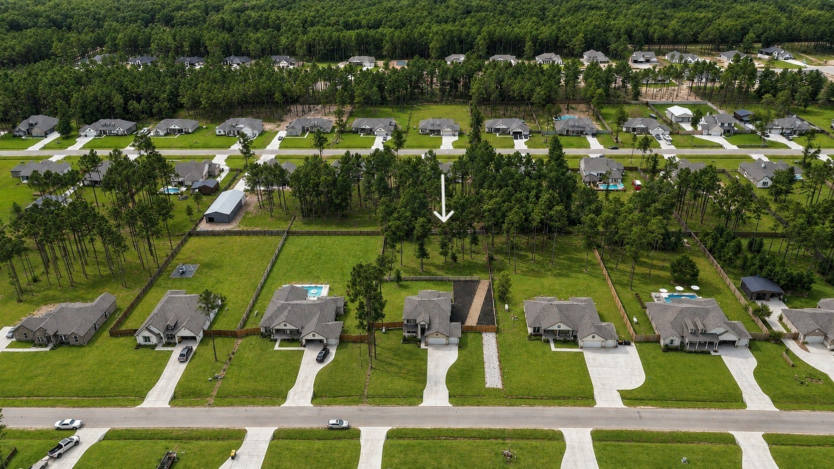 13432 Maverick Trail Road, Conroe, TX 77303 Nestled on 3/4 an acre with mature trees and privacy!