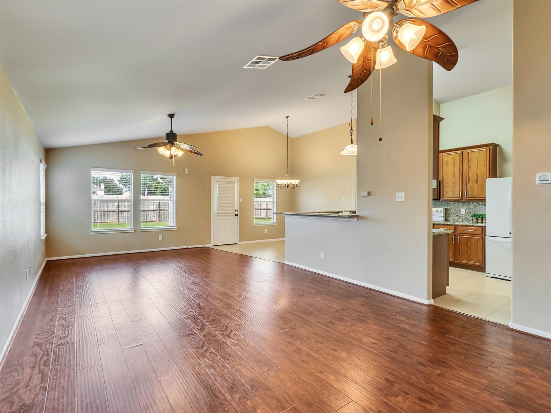 4027 Bentwood Drive, Dickinson, TX 77539 This spacious open-concept living area flows seamlessly into the kitchen, creating the perfect space for entertaining or family gatherings.