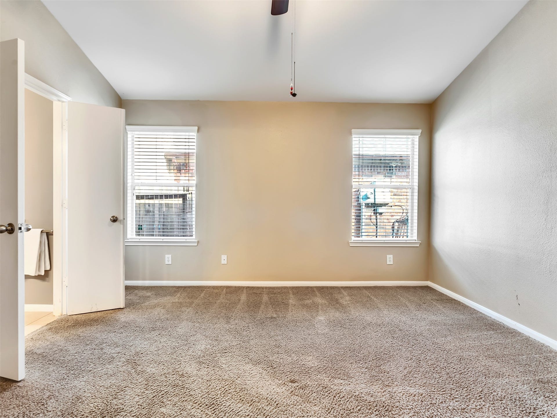 4027 Bentwood Drive, Dickinson, TX 77539 The private en-suite bathroom adds comfort and convenience, creating a peaceful space to start and end each day.