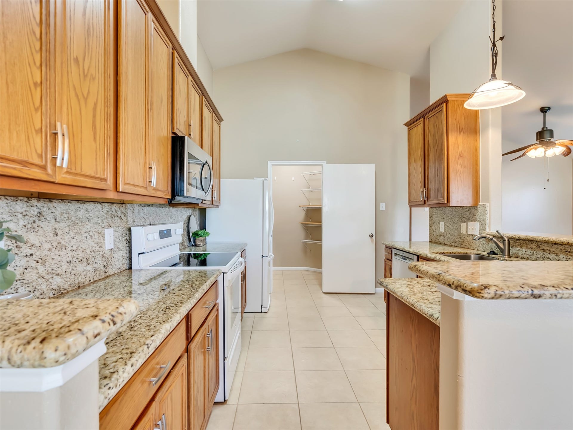 4027 Bentwood Drive, Dickinson, TX 77539 The electric stove also has gas available.
