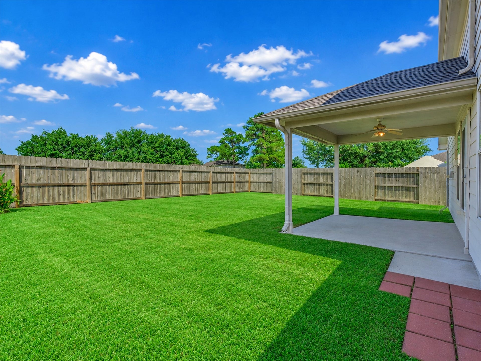4027 Bentwood Drive, Dickinson, TX 77539 This covered patio is the perfect spot for sipping sweet tea, grilling with friends, or simply relaxing while enjoying the fresh air.