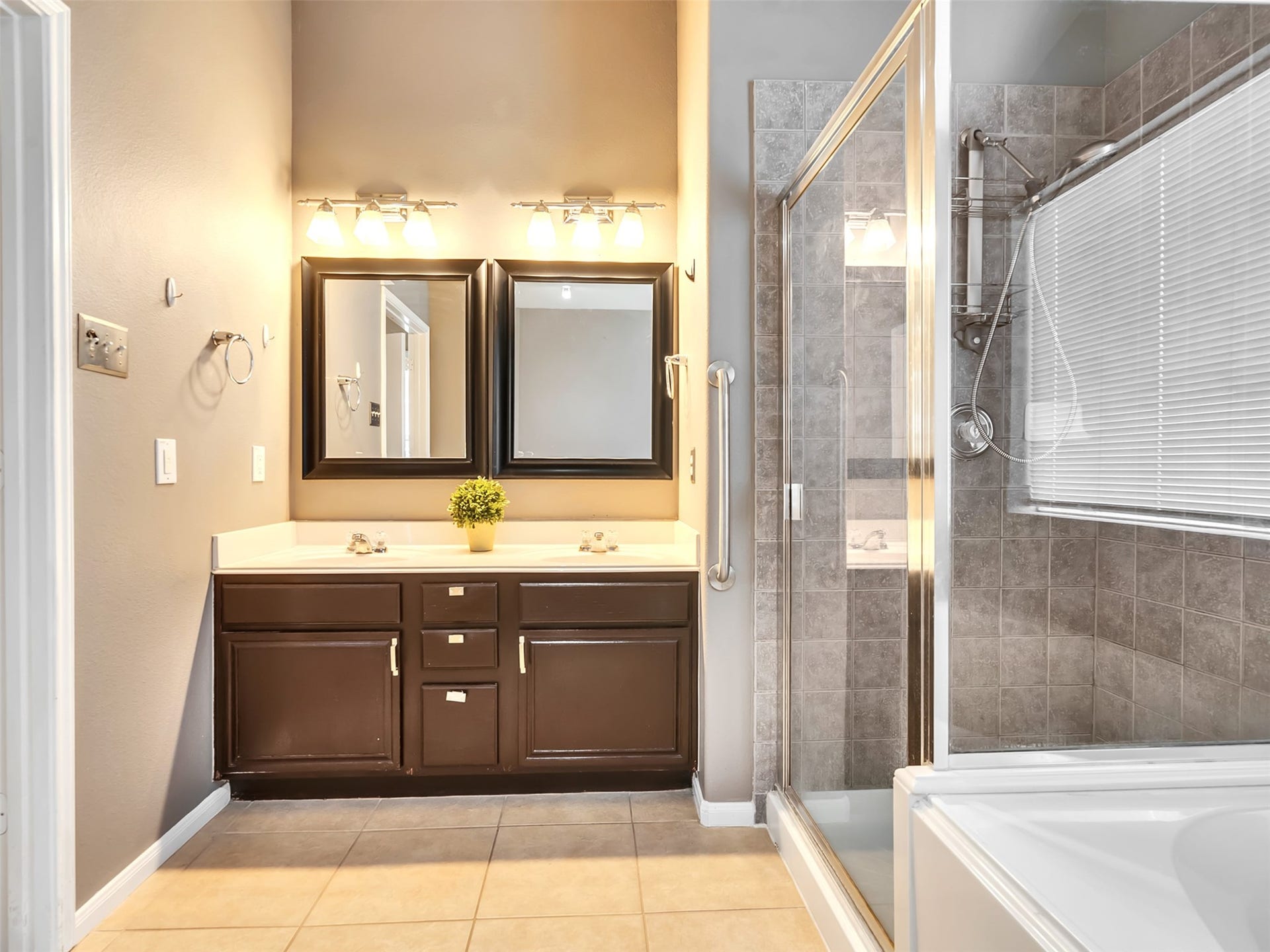 4027 Bentwood Drive, Dickinson, TX 77539 This dual-sink vanity makes busy mornings a breeze, offering plenty of room for two to get ready with ease. Thoughtfully designed for both style and functionality, it's a feature you'll appreciate every day.