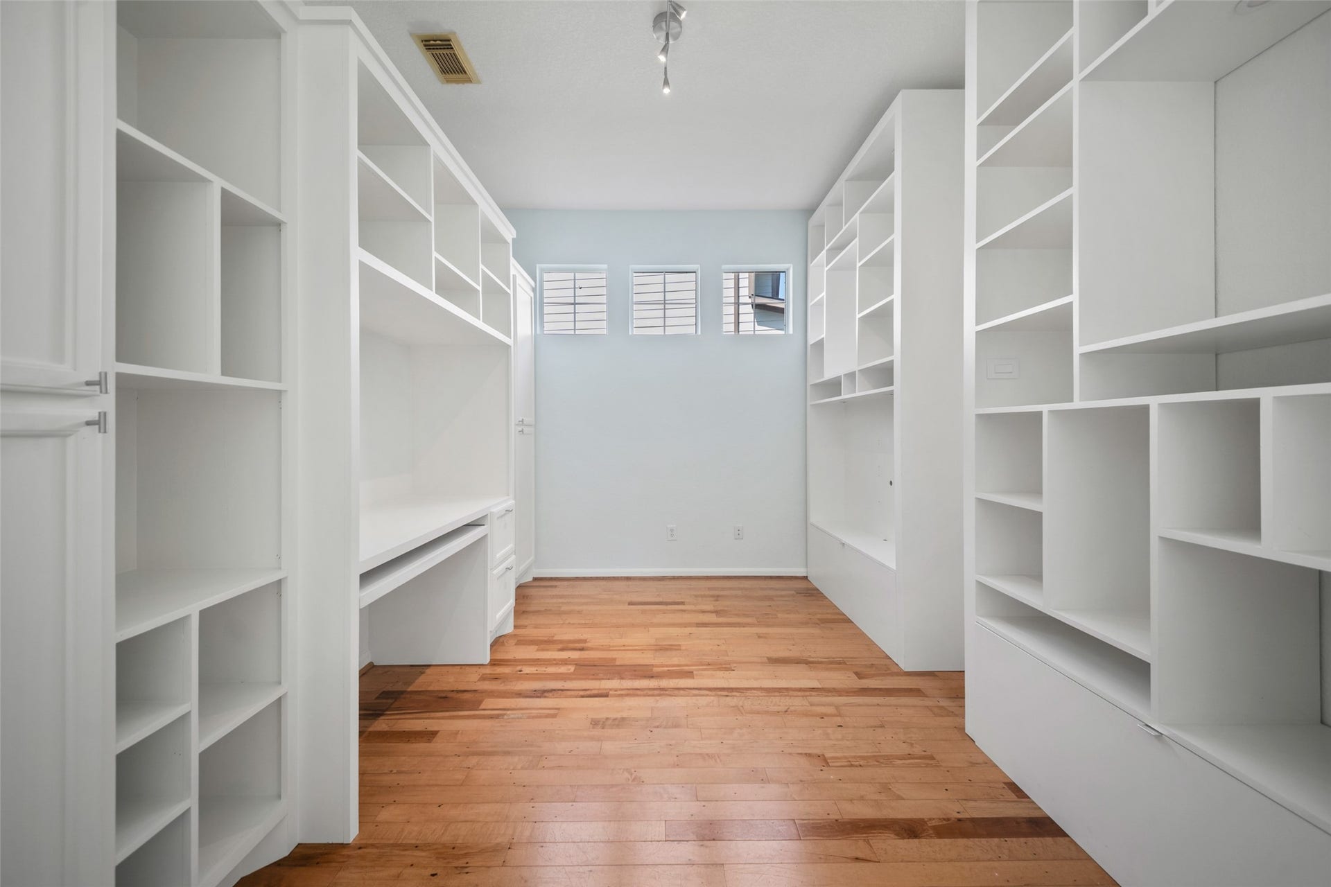 131 Zephyr Bend Place, The Woodlands, TX 77381 office area with built in cabinetry. cabinetry on the right of this photo is not built in, and can be remover for added floor space!