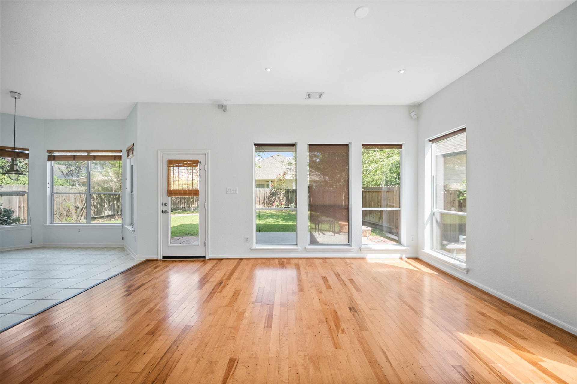 131 Zephyr Bend Place, The Woodlands, TX 77381 abundant with windows