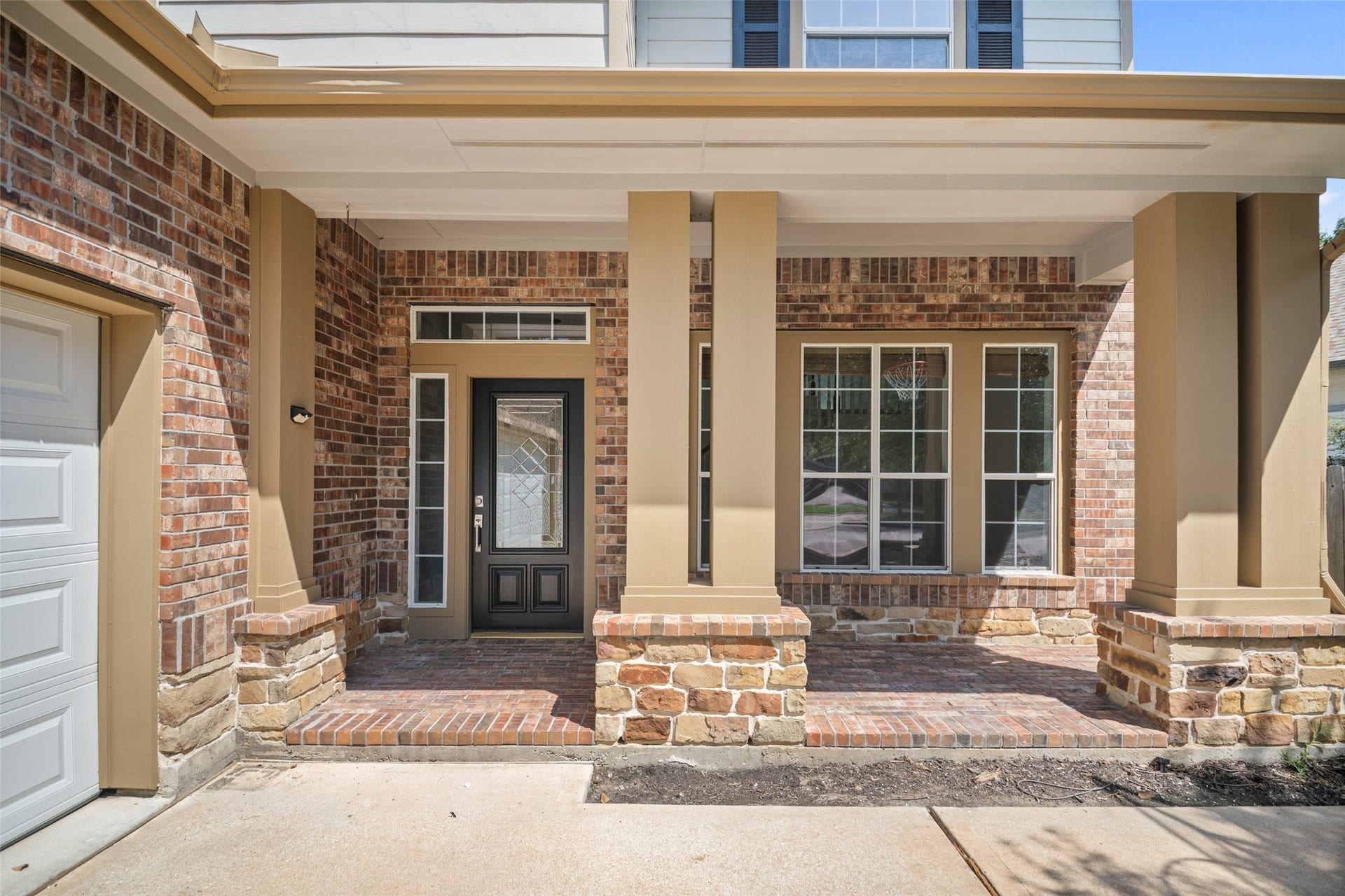 131 Zephyr Bend Place, The Woodlands, TX 77381 freshly painted exterior!