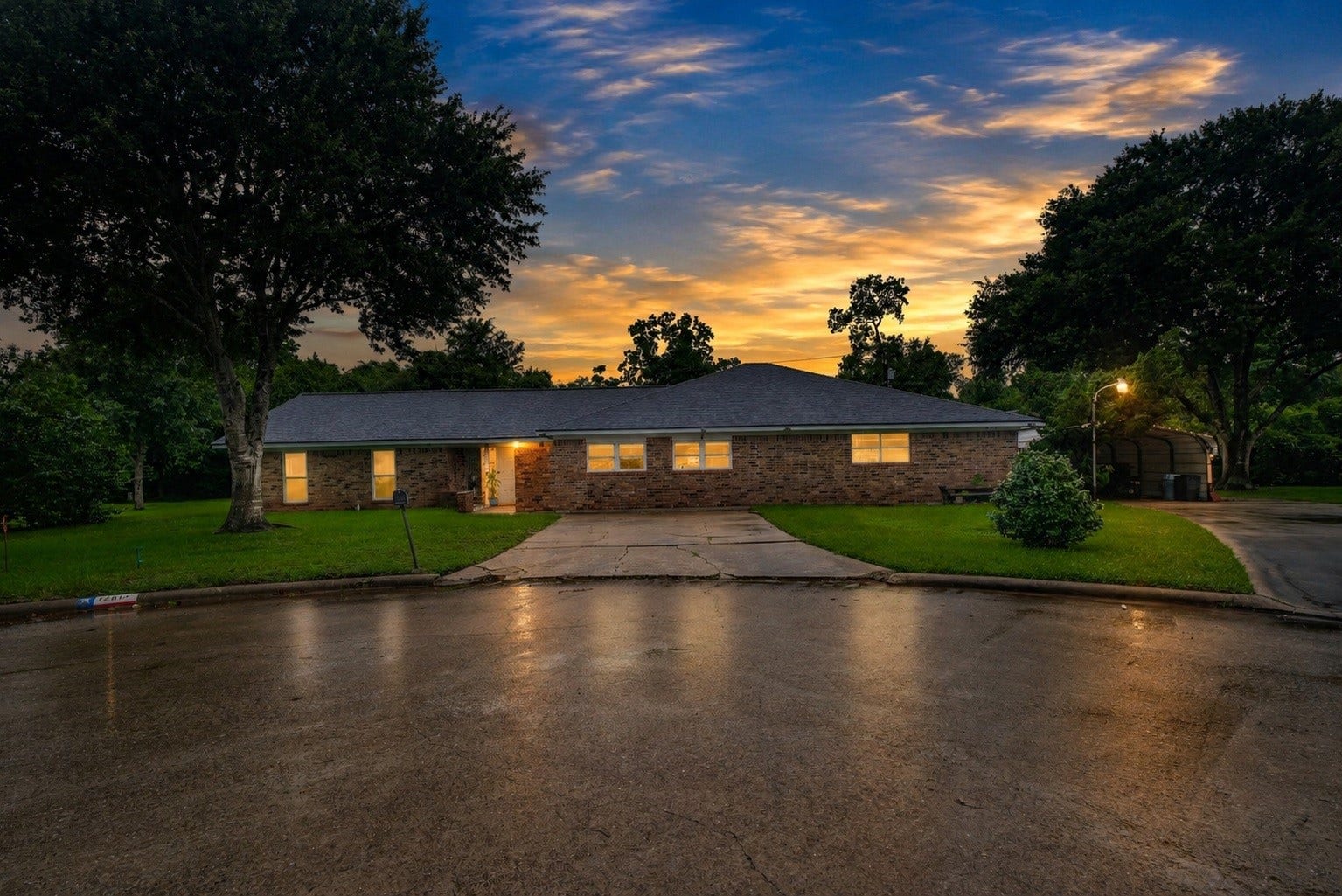 12614 C Bar Drive, Santa Fe, TX 77510 Evening Front Elevation