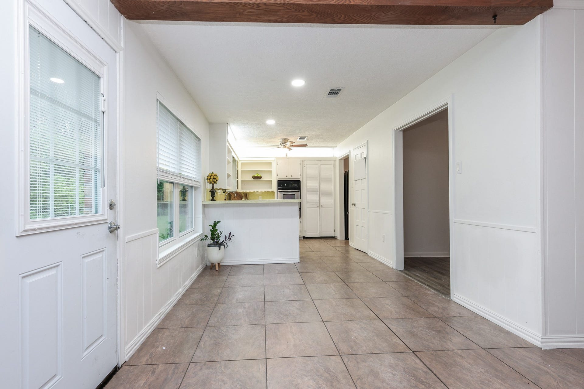12614 C Bar Drive, Santa Fe, TX 77510 Breakfast Nook and integrated mini blind backyard door with slider control.