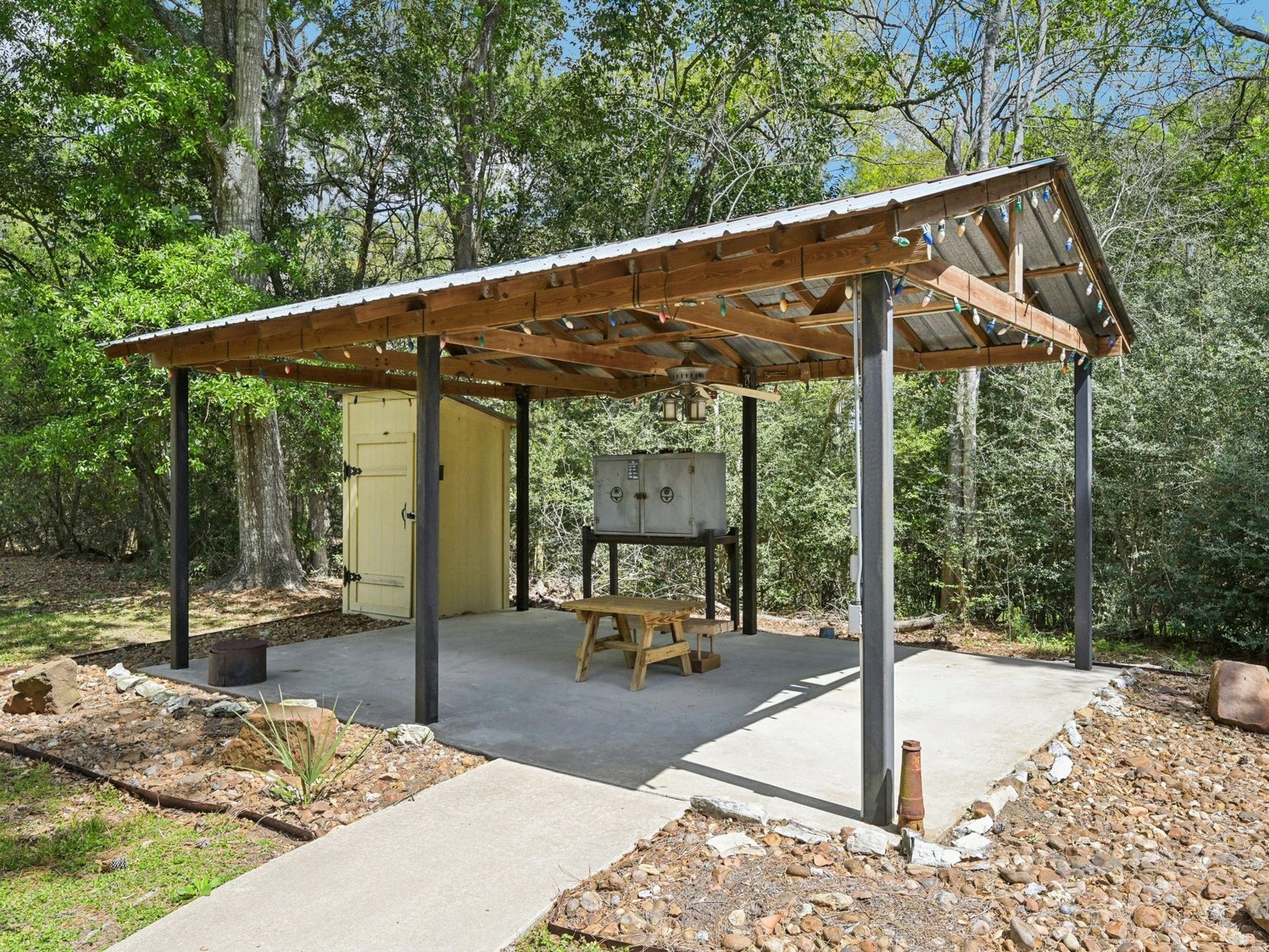 101-1/2 Avenue J, Dickinson, TX 77539 The covered BBQ area is the focal point of your outside fun.
