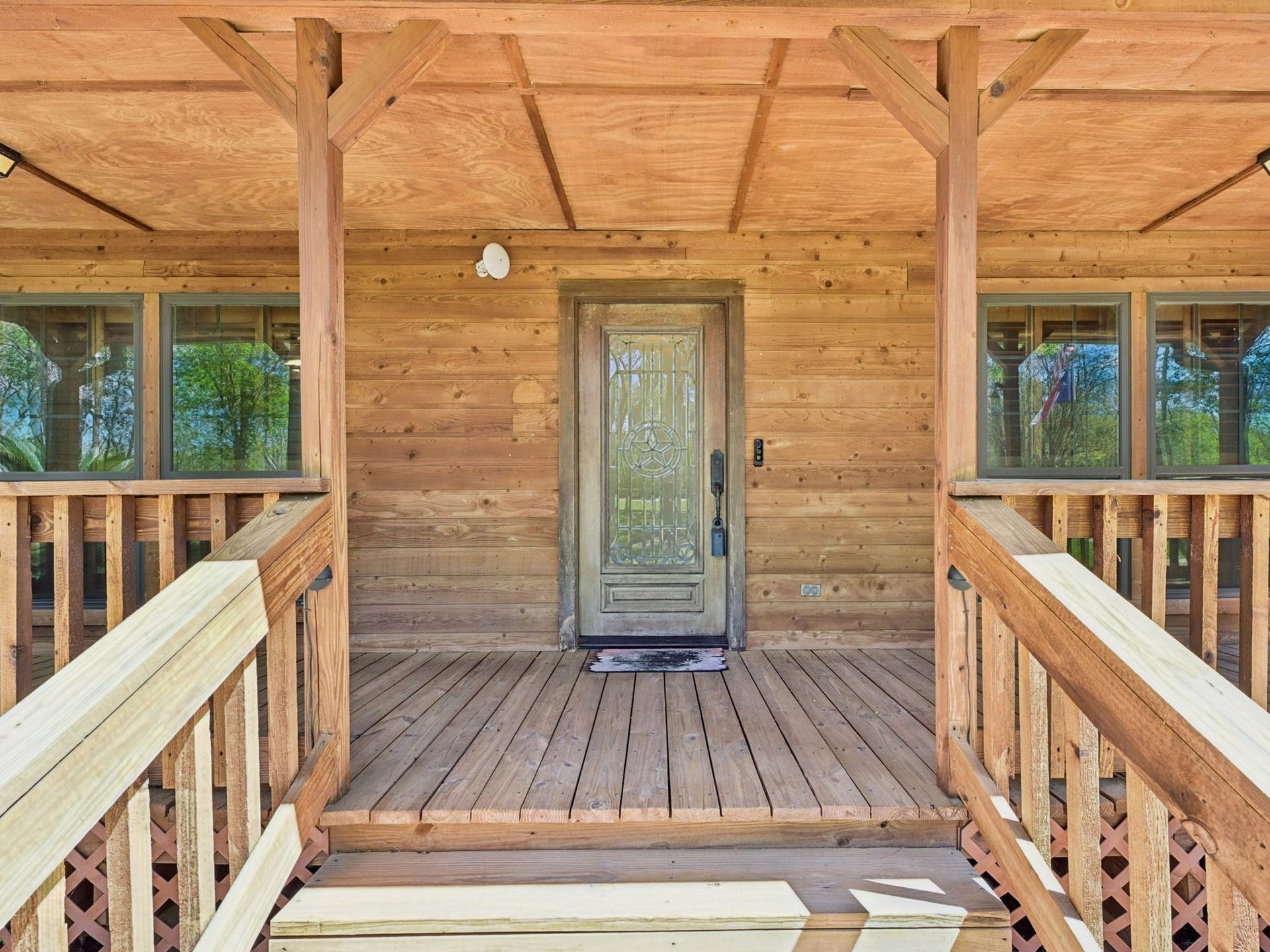 101-1/2 Avenue J, Dickinson, TX 77539 The covered front porch will beckon you.