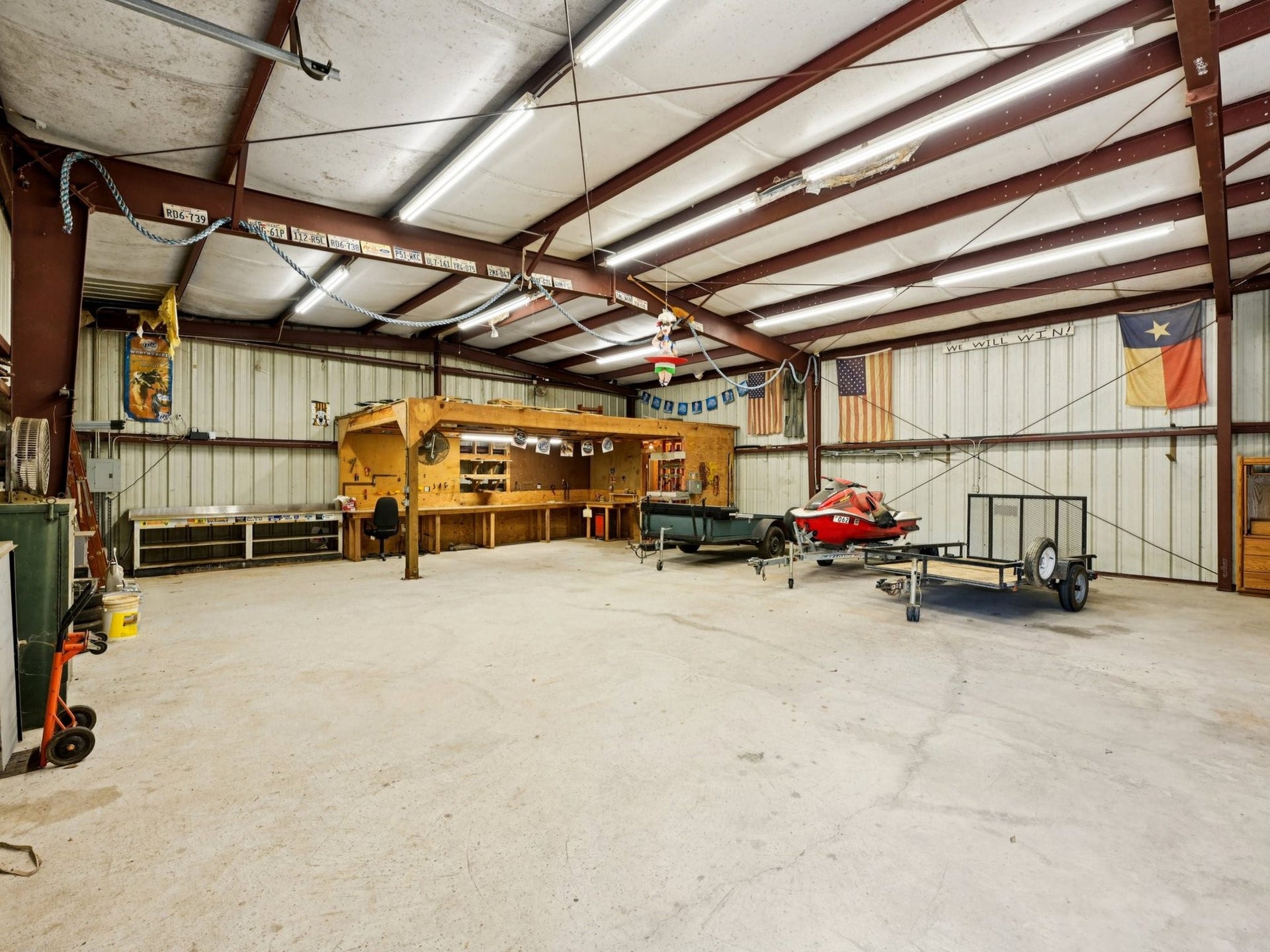 101-1/2 Avenue J, Dickinson, TX 77539 This is the boat parking area inside the workshop. This space is plumbed for your future bathroom installation.