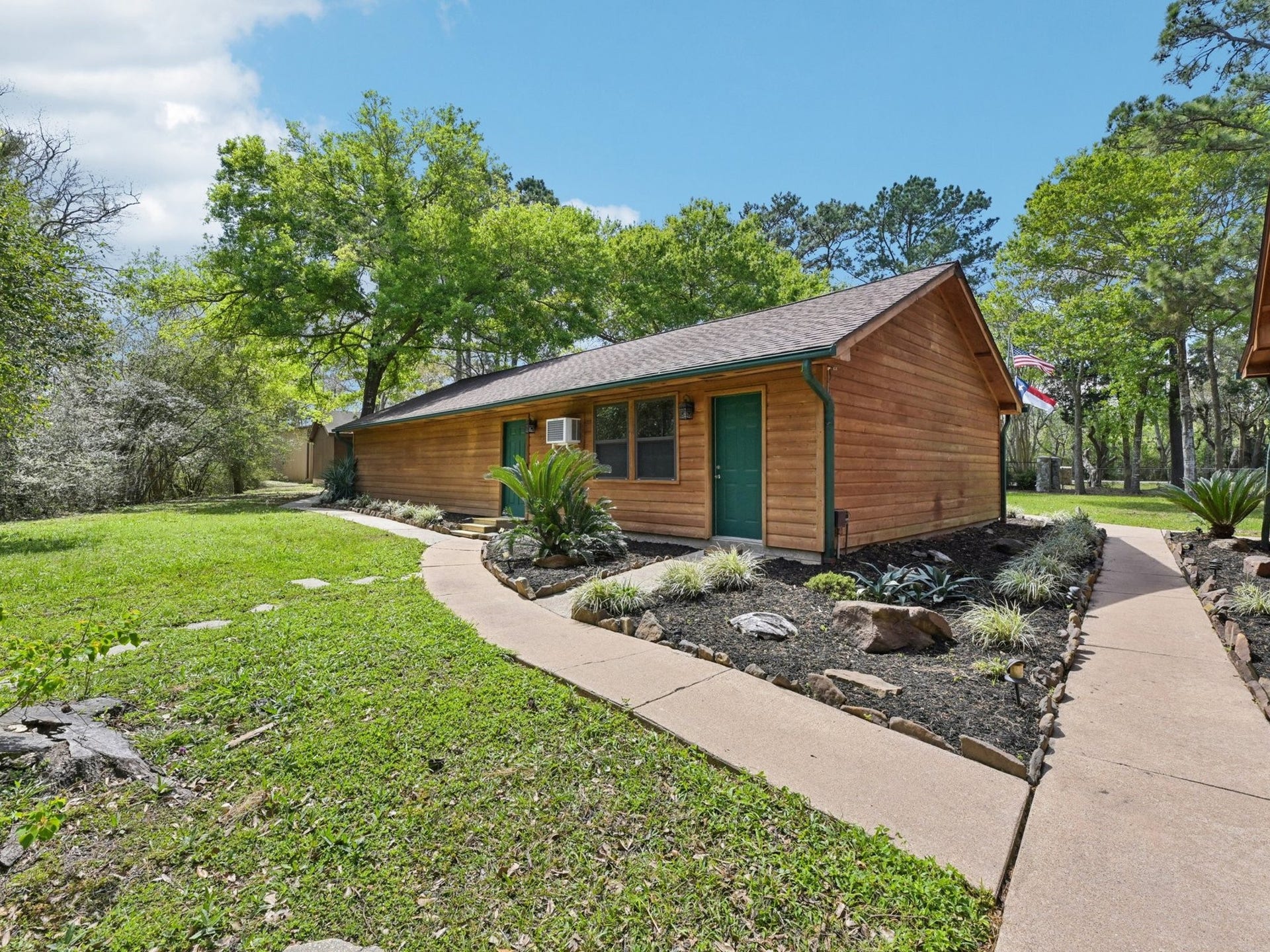 101-1/2 Avenue J, Dickinson, TX 77539 The back view of the garage and Game Room.