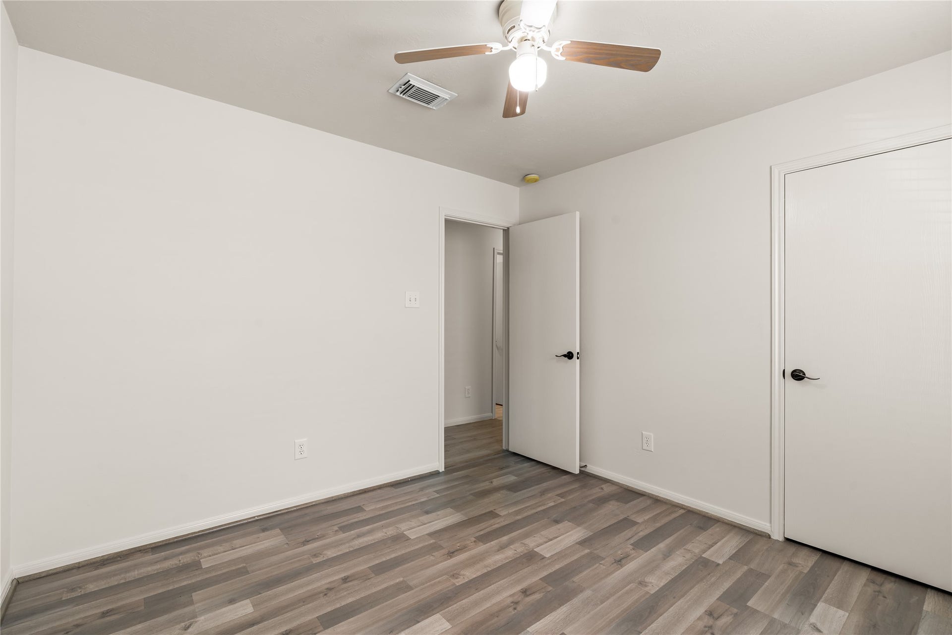 17042 Midnight Sun Lane, Richmond, TX 77407 Comfortable bedroom offering privacy and functionality for family members or guests.