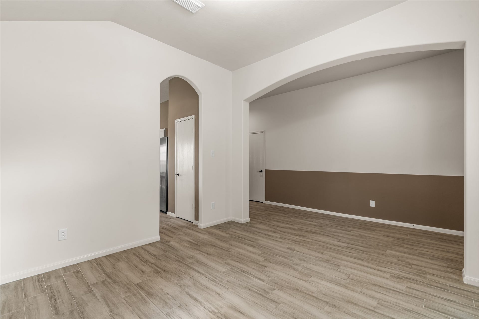 17042 Midnight Sun Lane, Richmond, TX 77407 Updated vinyl flooring, fresh paint, and abundant natural light create a bright and inviting atmosphere throughout the home.