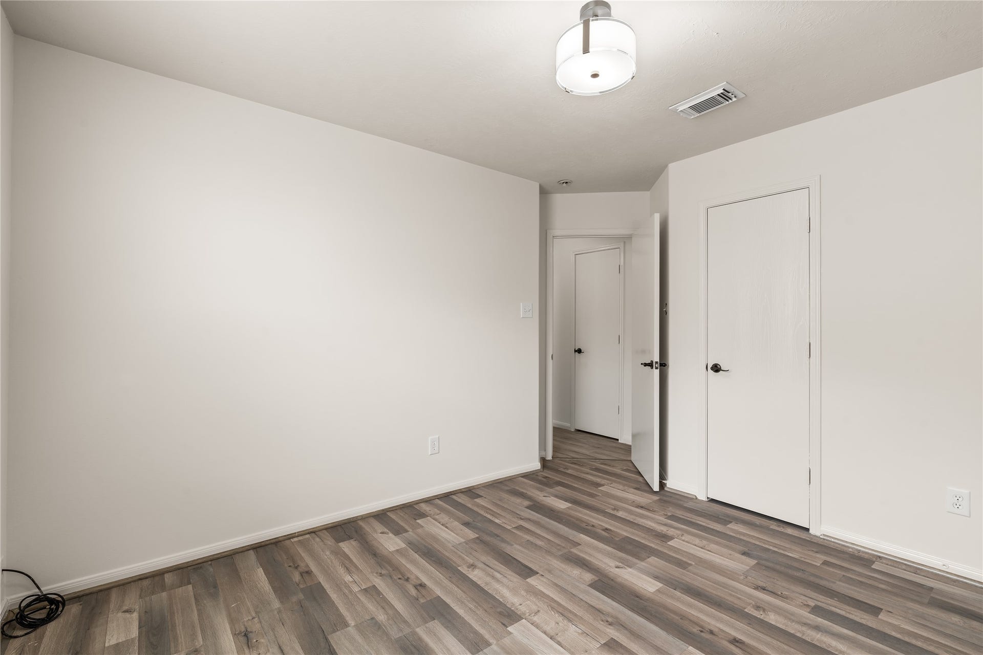 17042 Midnight Sun Lane, Richmond, TX 77407 Comfortable secondary bedroom featuring a neutral color palette that's ready for your personal touch.