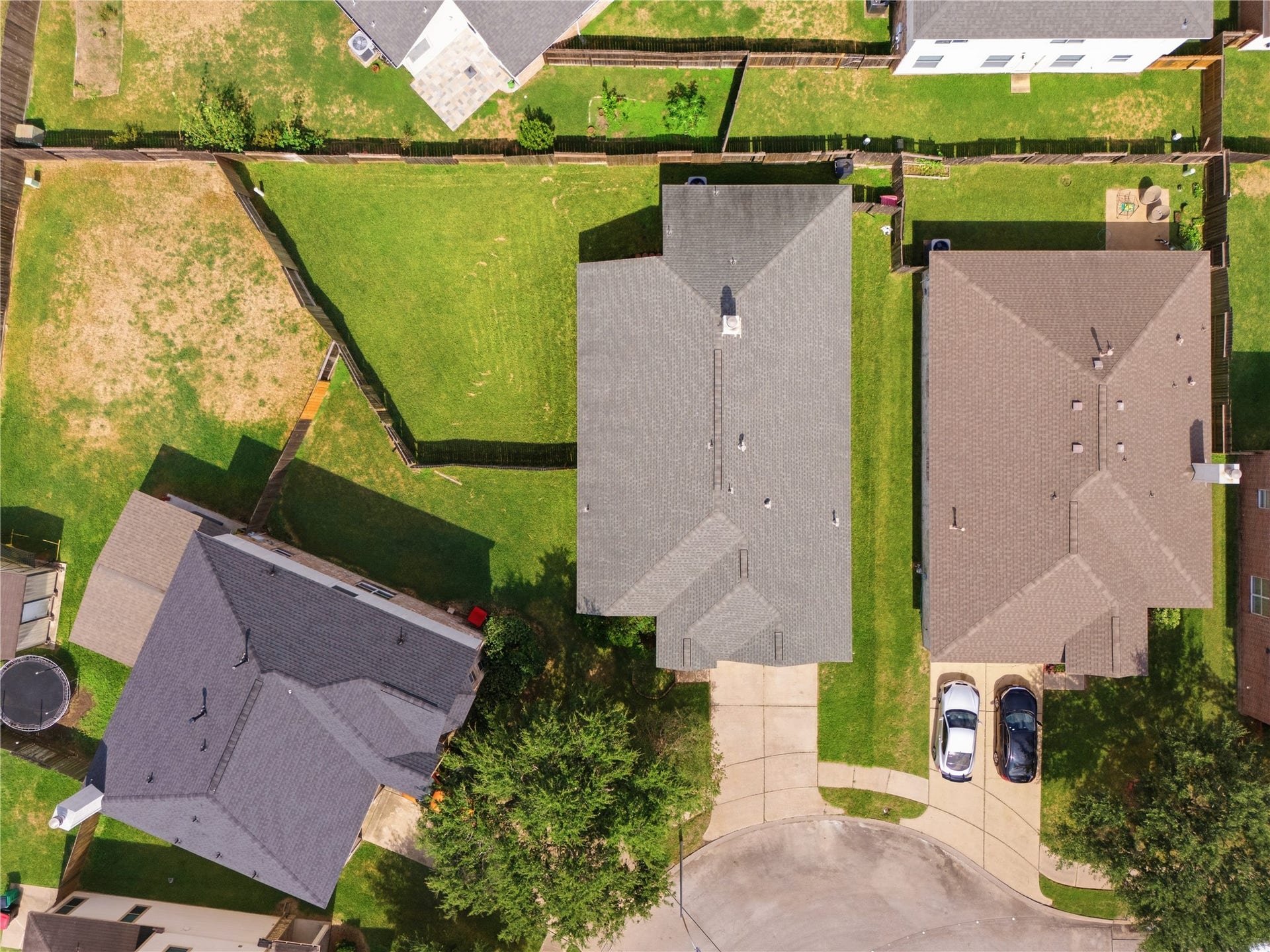 17042 Midnight Sun Lane, Richmond, TX 77407 Bird's-eye view showcasing the generous backyard and desirable cul-de-sac location.