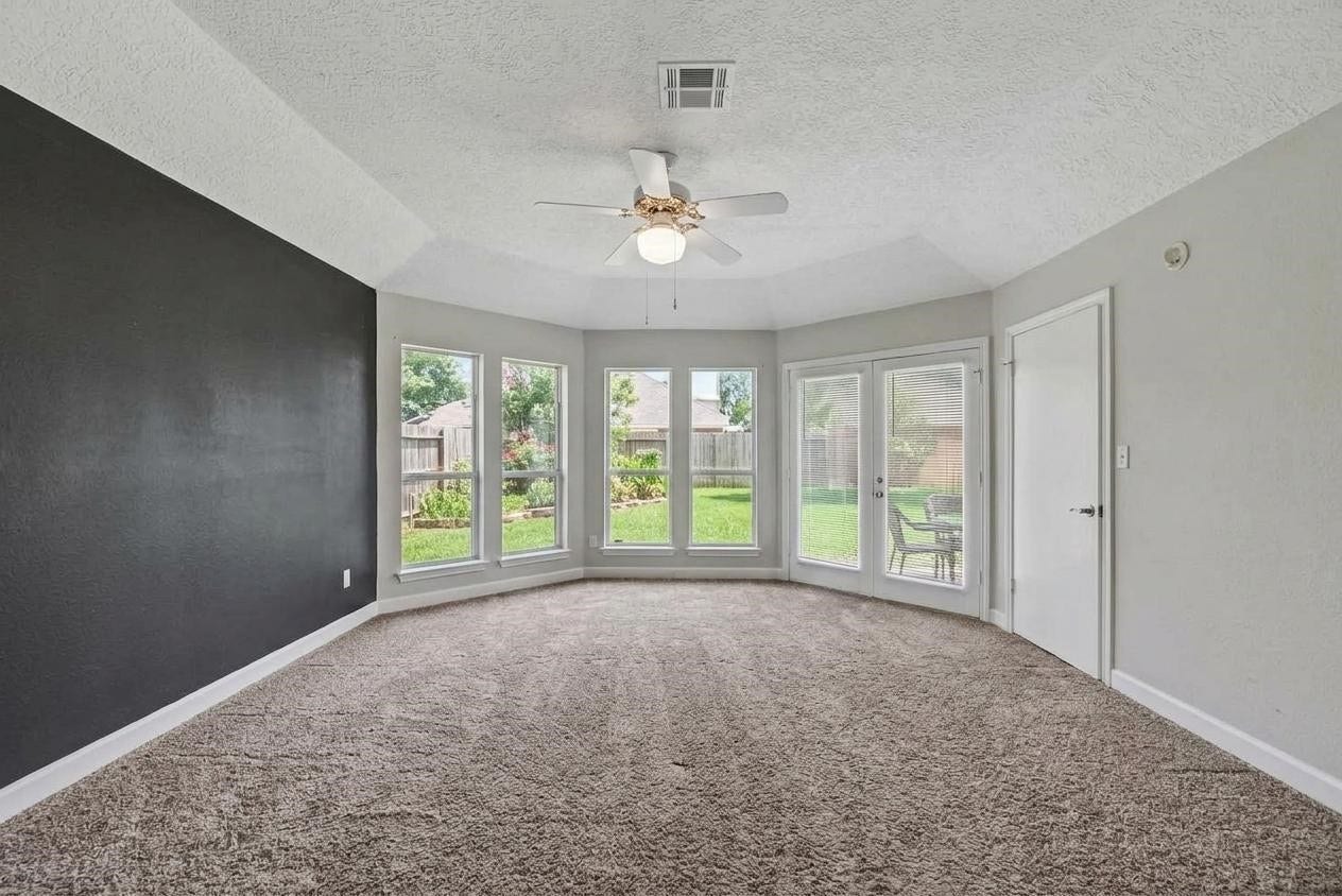 1523 Plantation Drive, Richmond, TX 77406 Primary suite shown unfurnished.