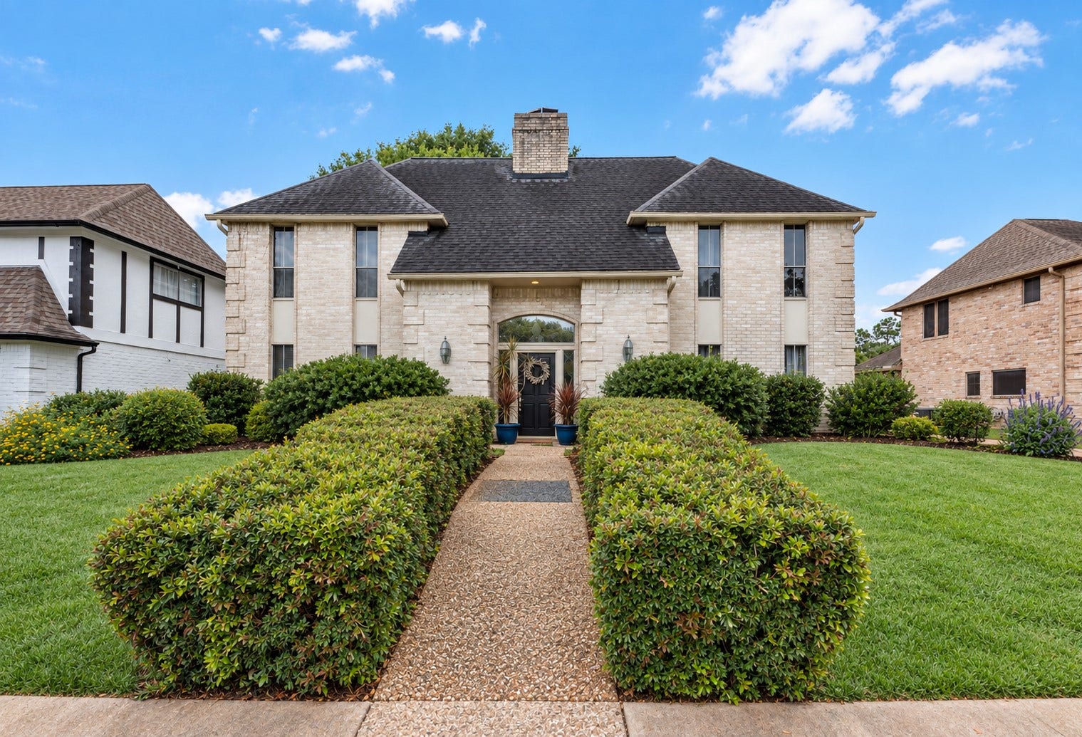 1523 Plantation Drive, Richmond, TX 77406 Striking front view of the home and well manicured front path.