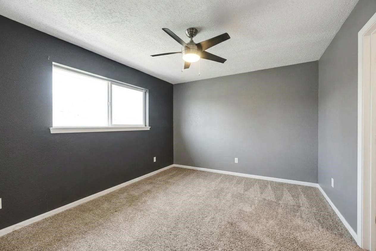 1523 Plantation Drive, Richmond, TX 77406 Bedroom 3 shown unfurnished.