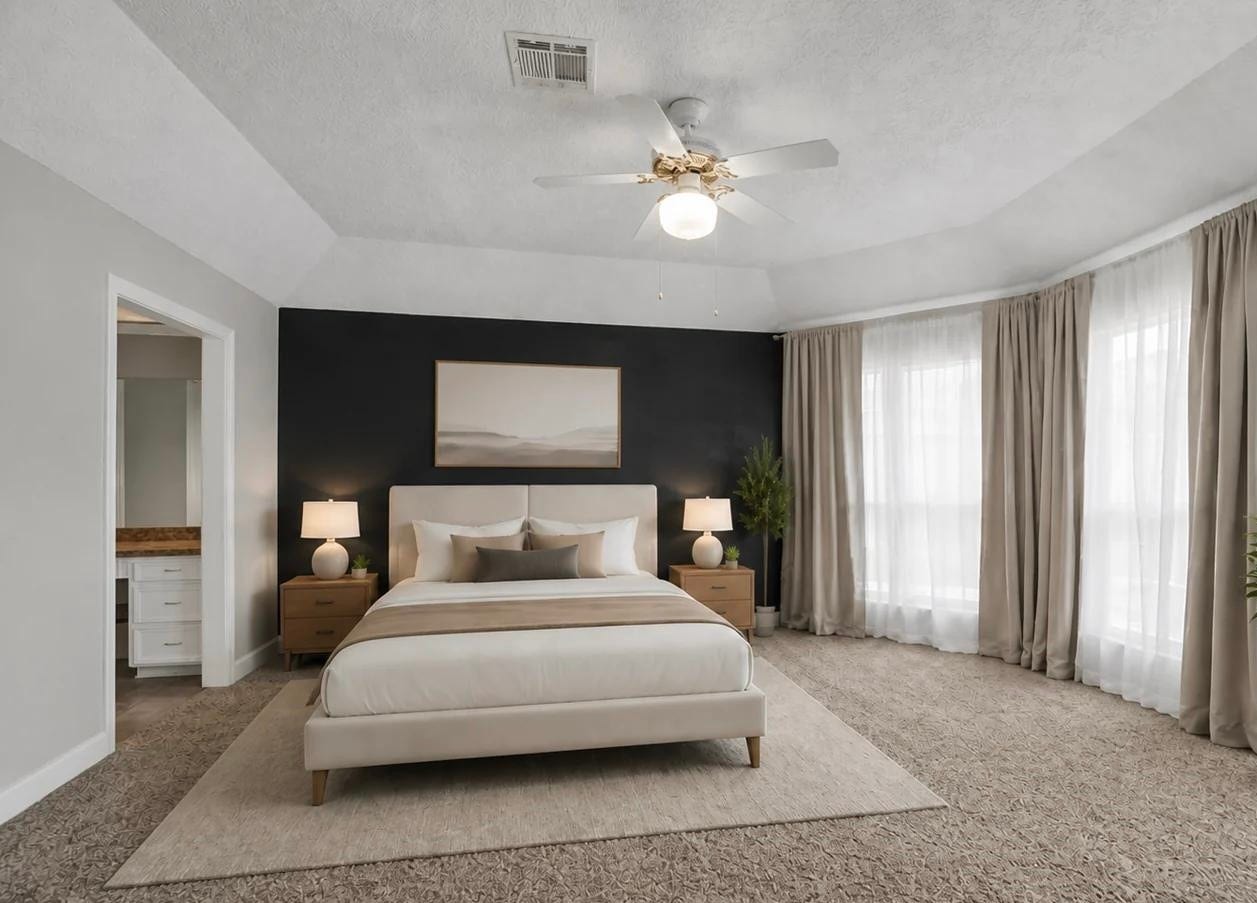 1523 Plantation Drive, Richmond, TX 77406 Spacious Primary suite with natural light. Shown virtually staged.