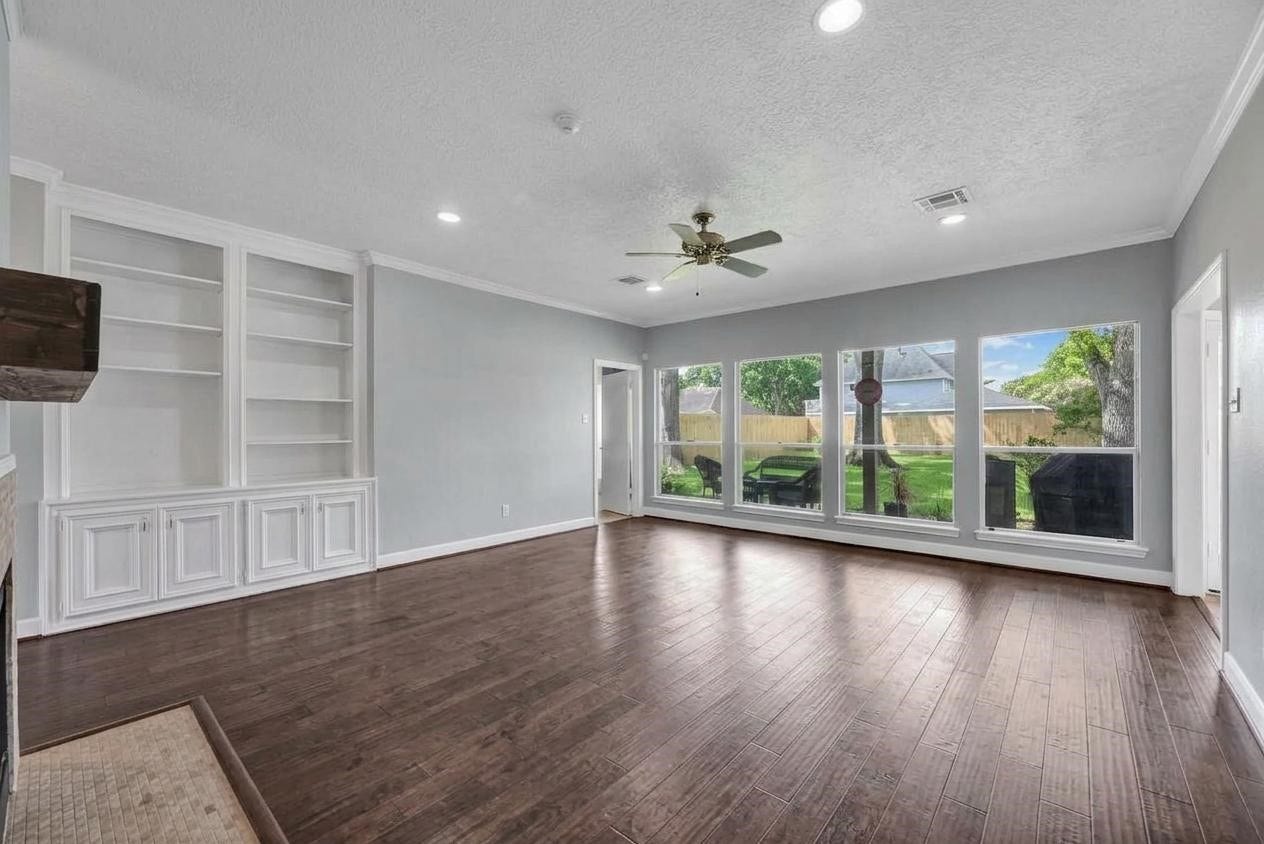 1523 Plantation Drive, Richmond, TX 77406 Family room shown unfurnished.