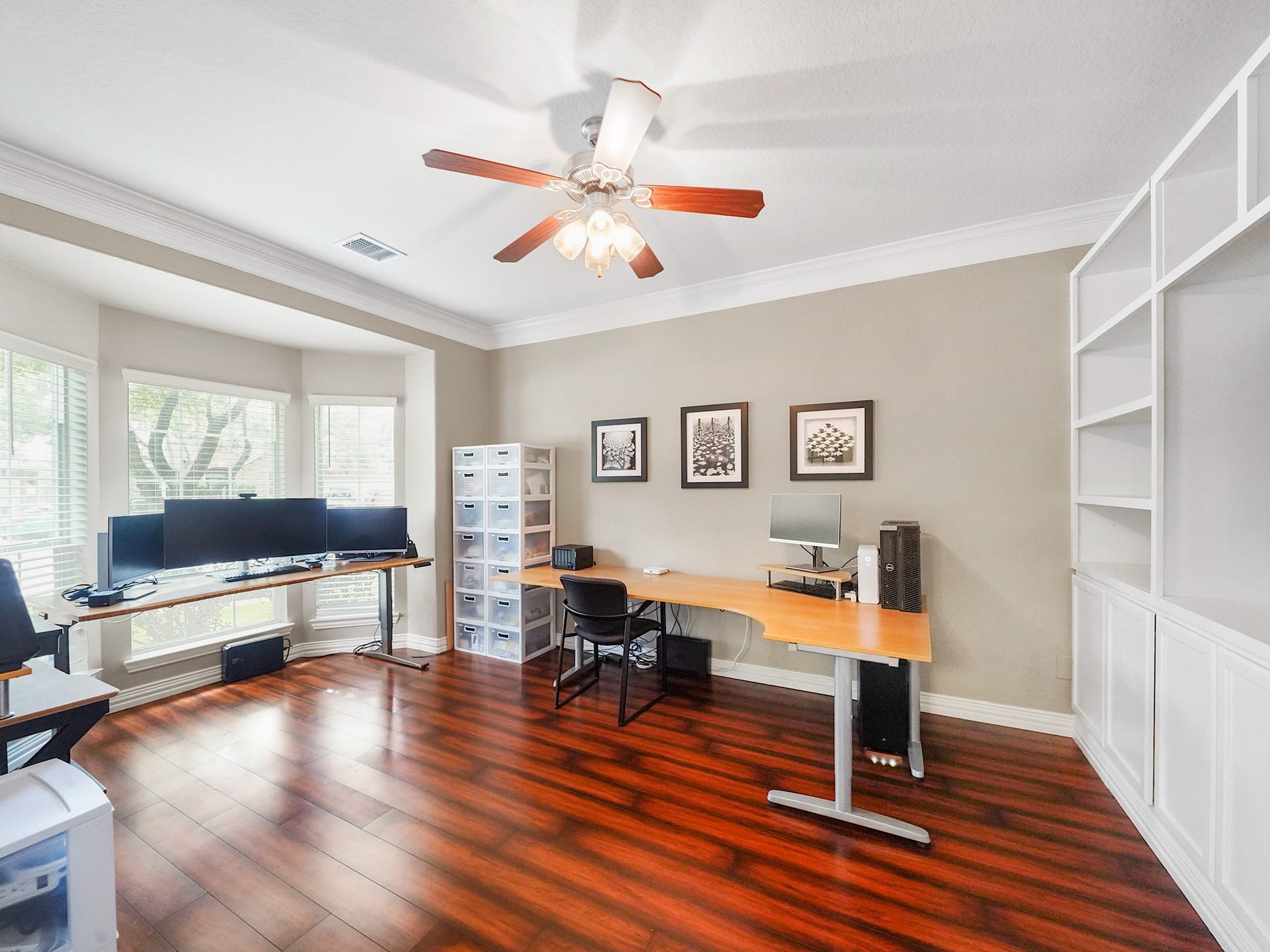 26214 Seminole Hill Lane, Katy, TX 77494 Custom built-ins, rich flooring, and abundant natural light create a workspace that is as functional as it is refined.