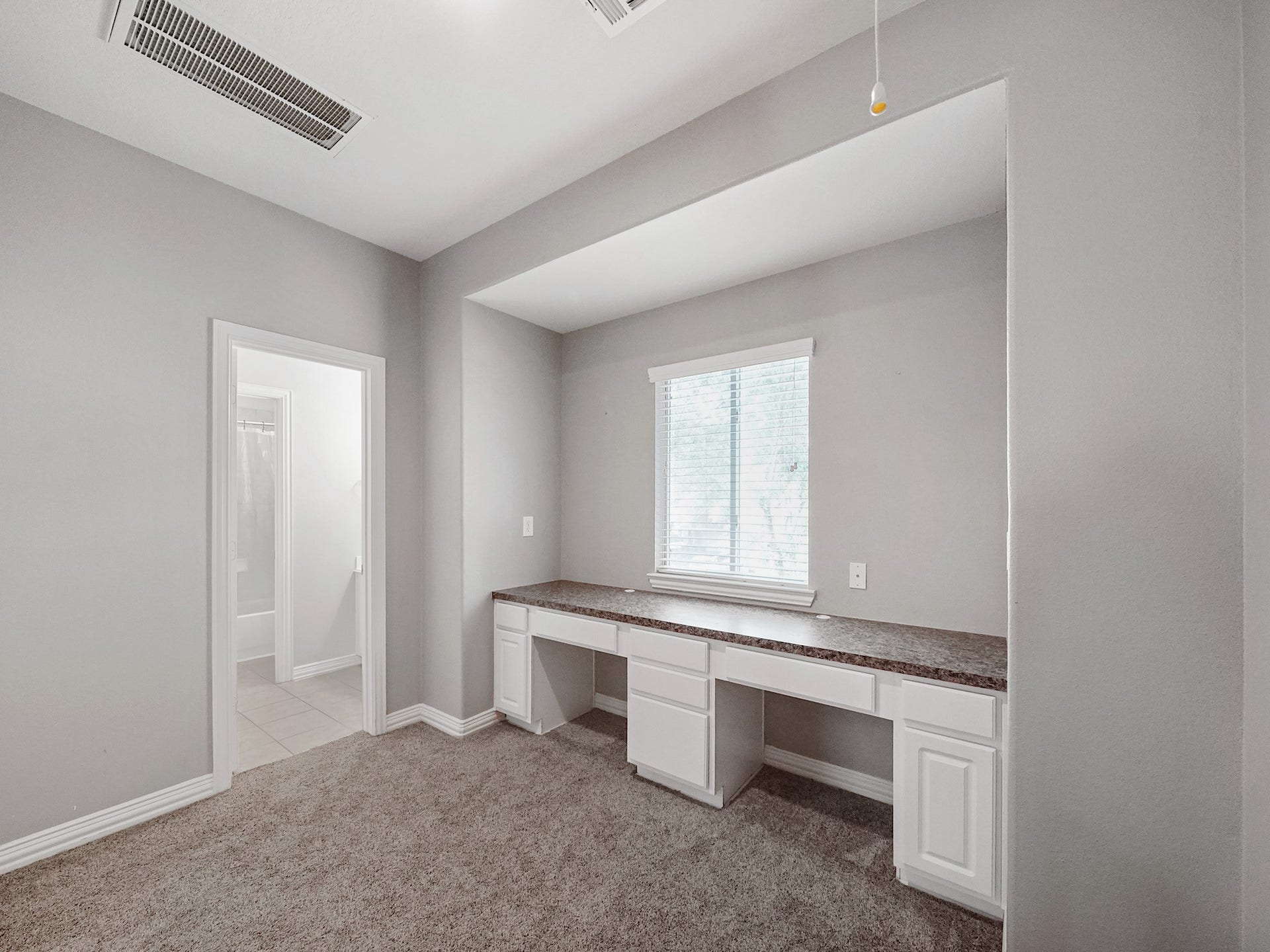 26214 Seminole Hill Lane, Katy, TX 77494 A second built-in workspace provides the perfect spot for studying, working remotely, or managing day-to-day tasks while keeping the main living areas clutter-free.