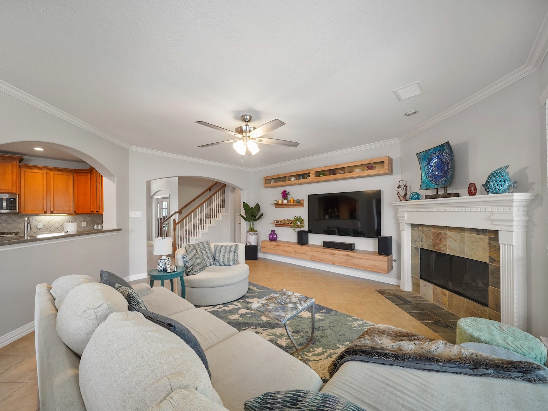26214 Seminole Hill Lane, Katy, TX 77494 The open flow between the family room and kitchen keeps everyone connected while allowing each space to shine.