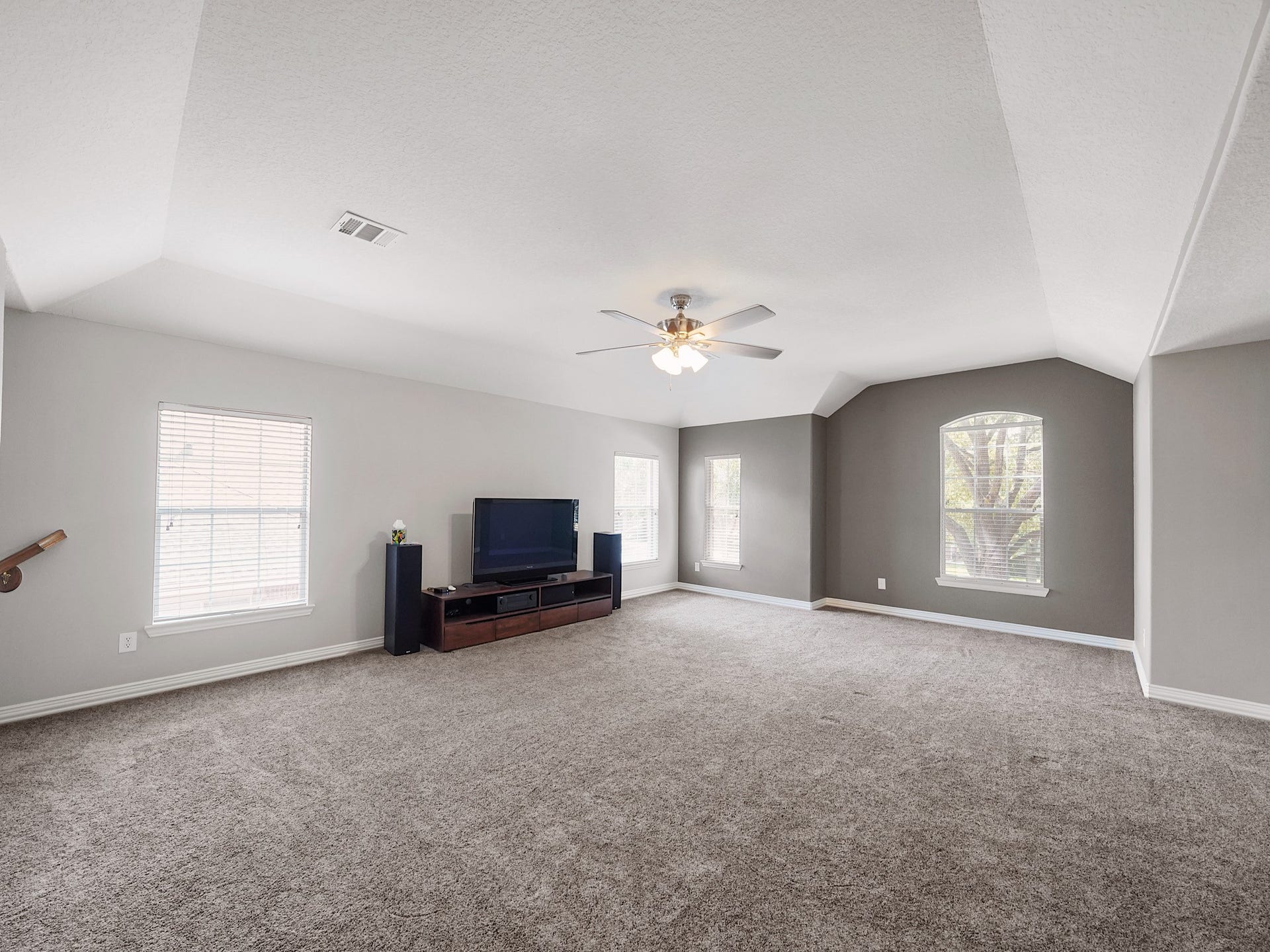 26214 Seminole Hill Lane, Katy, TX 77494 With soaring ceilings and generous dimensions, this versatile space easily accommodates multiple seating and recreation areas.