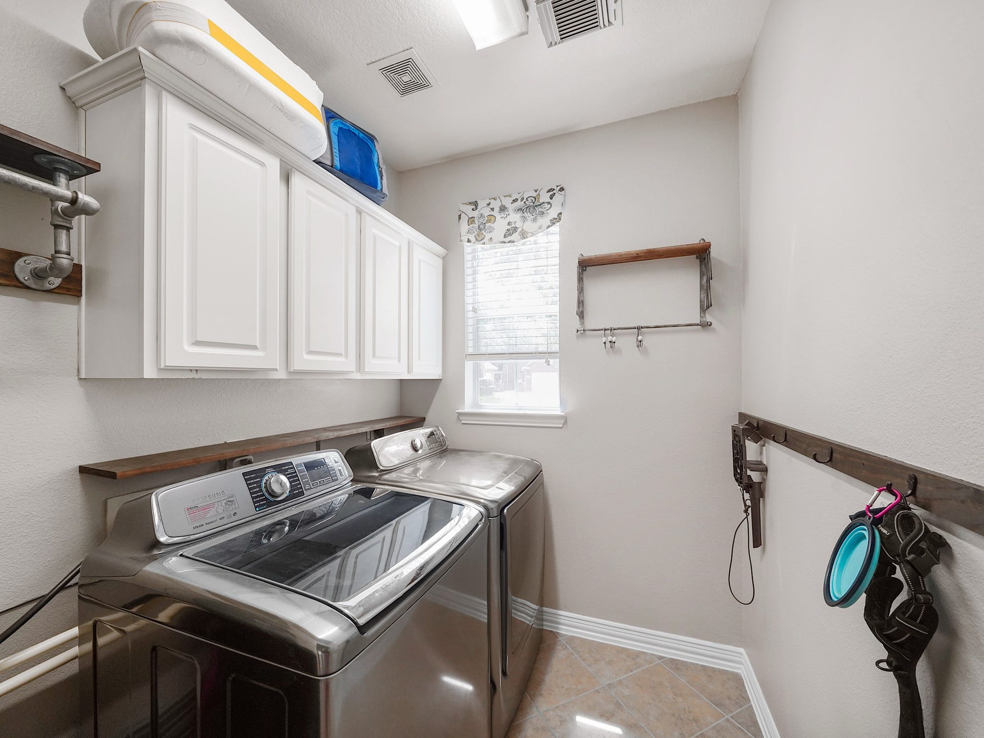 26214 Seminole Hill Lane, Katy, TX 77494 Thoughtfully designed with storage and functionality in mind, the utility room helps keep daily routines organized and efficient.