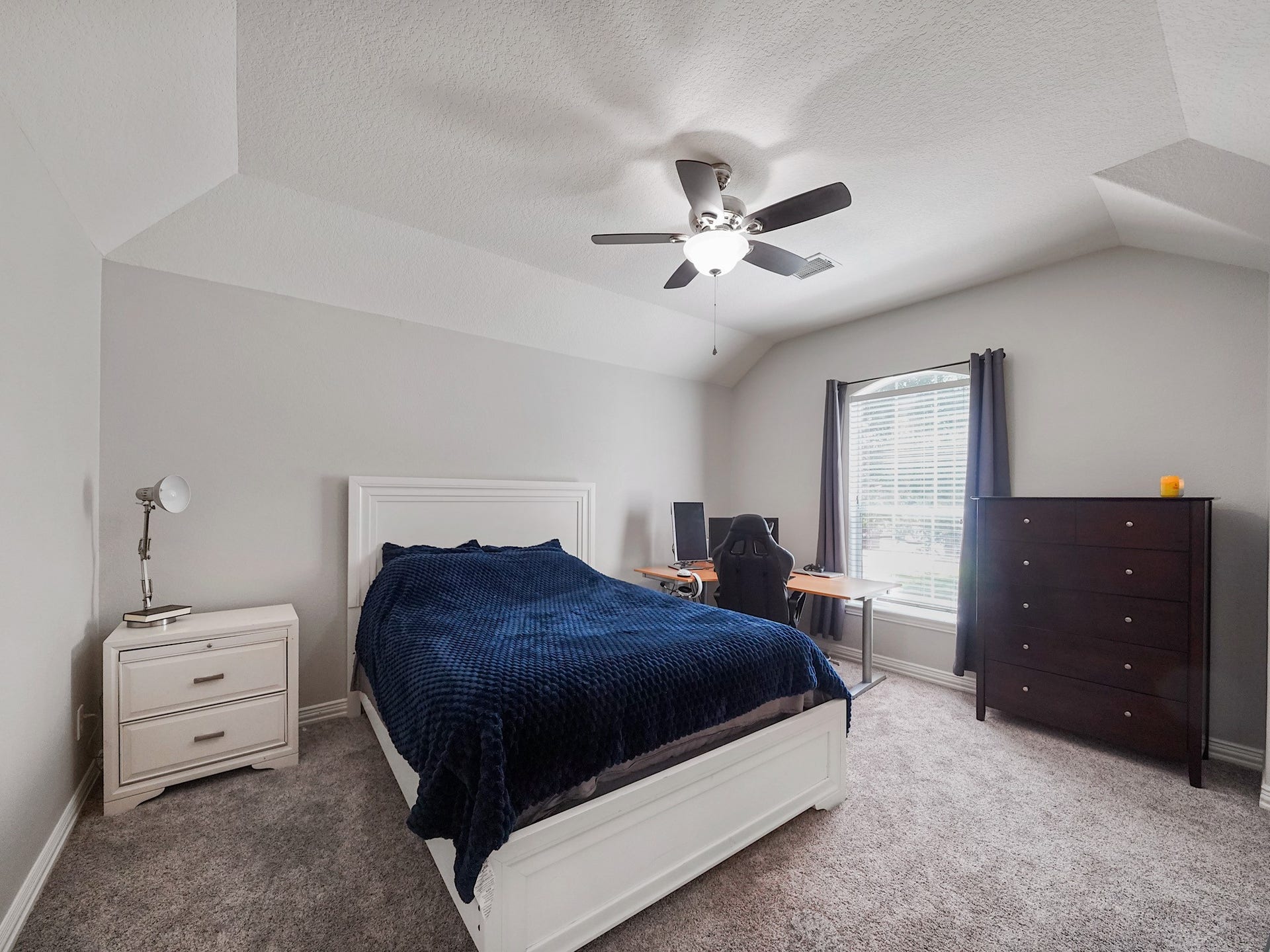 26214 Seminole Hill Lane, Katy, TX 77494 Spacious and inviting, this bedroom features abundant natural light and a large closet for exceptional storage.