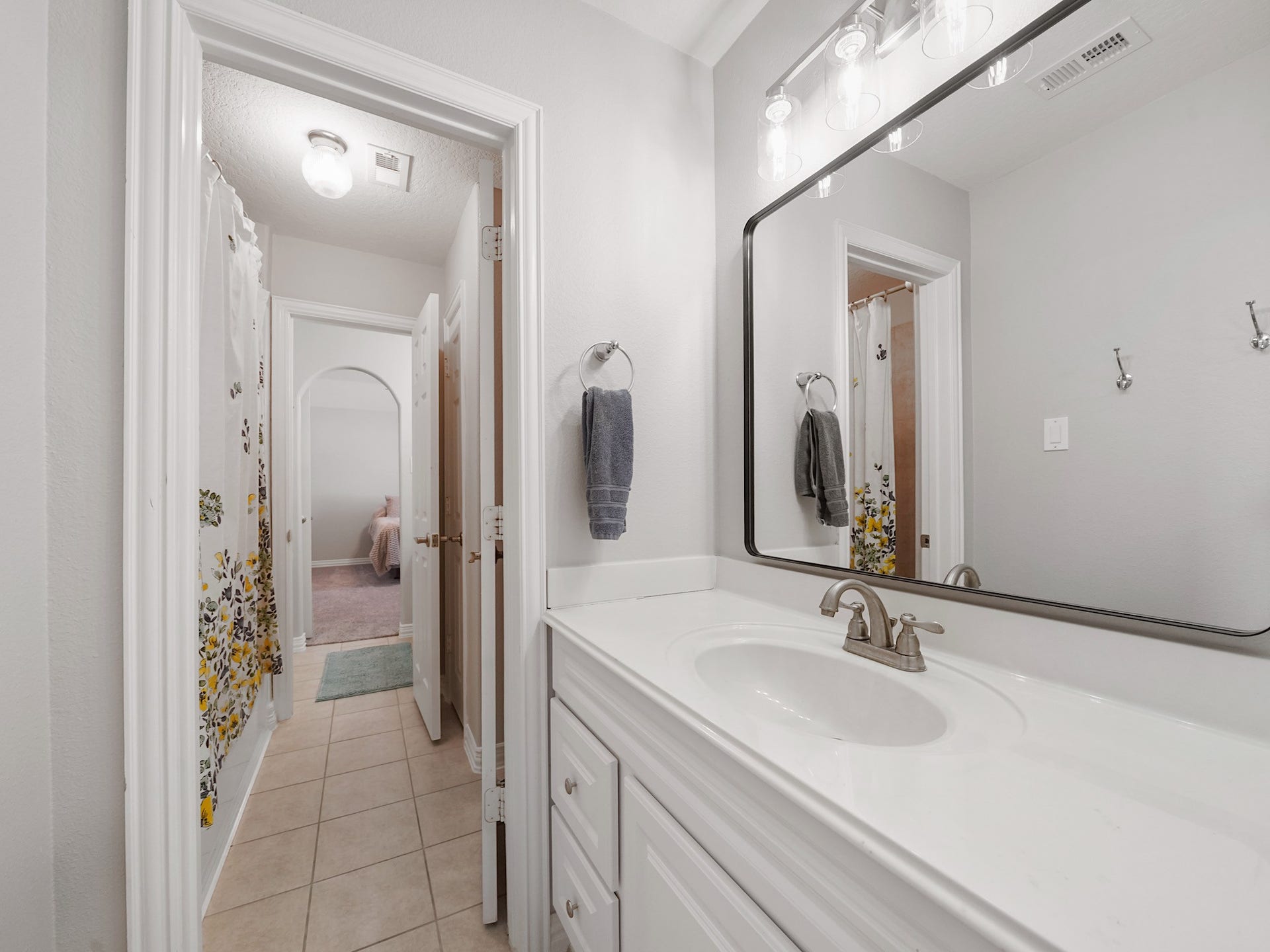 26214 Seminole Hill Lane, Katy, TX 77494 Thoughtfully designed to connect two secondary bedrooms, the Jack & Jill bath balances privacy with everyday functionality.