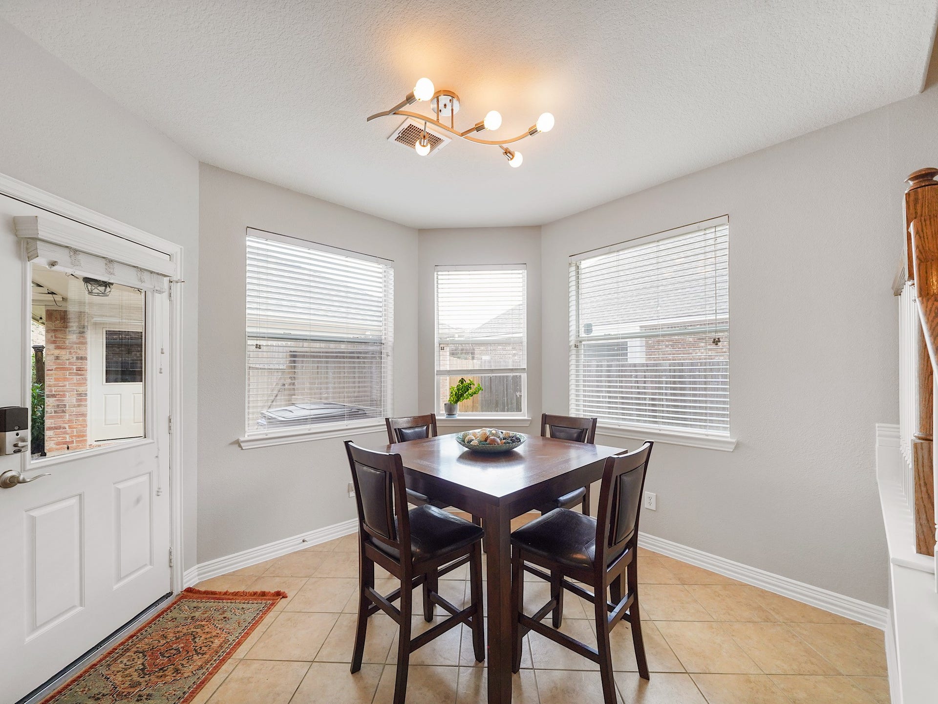 26214 Seminole Hill Lane, Katy, TX 77494 Surrounded by windows and backyard views, the breakfast room provides a bright and cheerful setting to start each day.