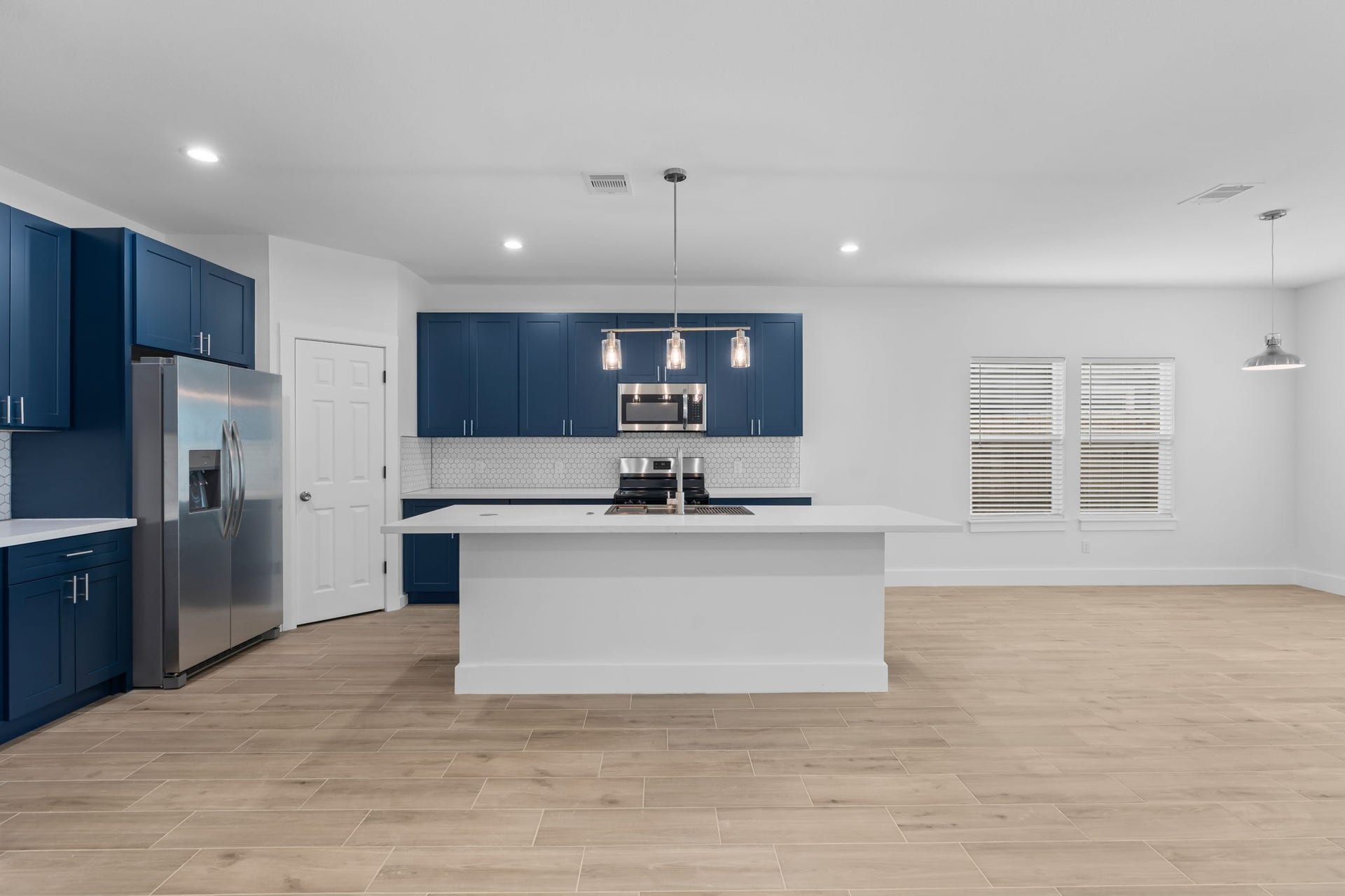 1303 Hawthorne Street, Baytown, TX 77520 Large kitchen island with seating space, and the refrigerator is included!