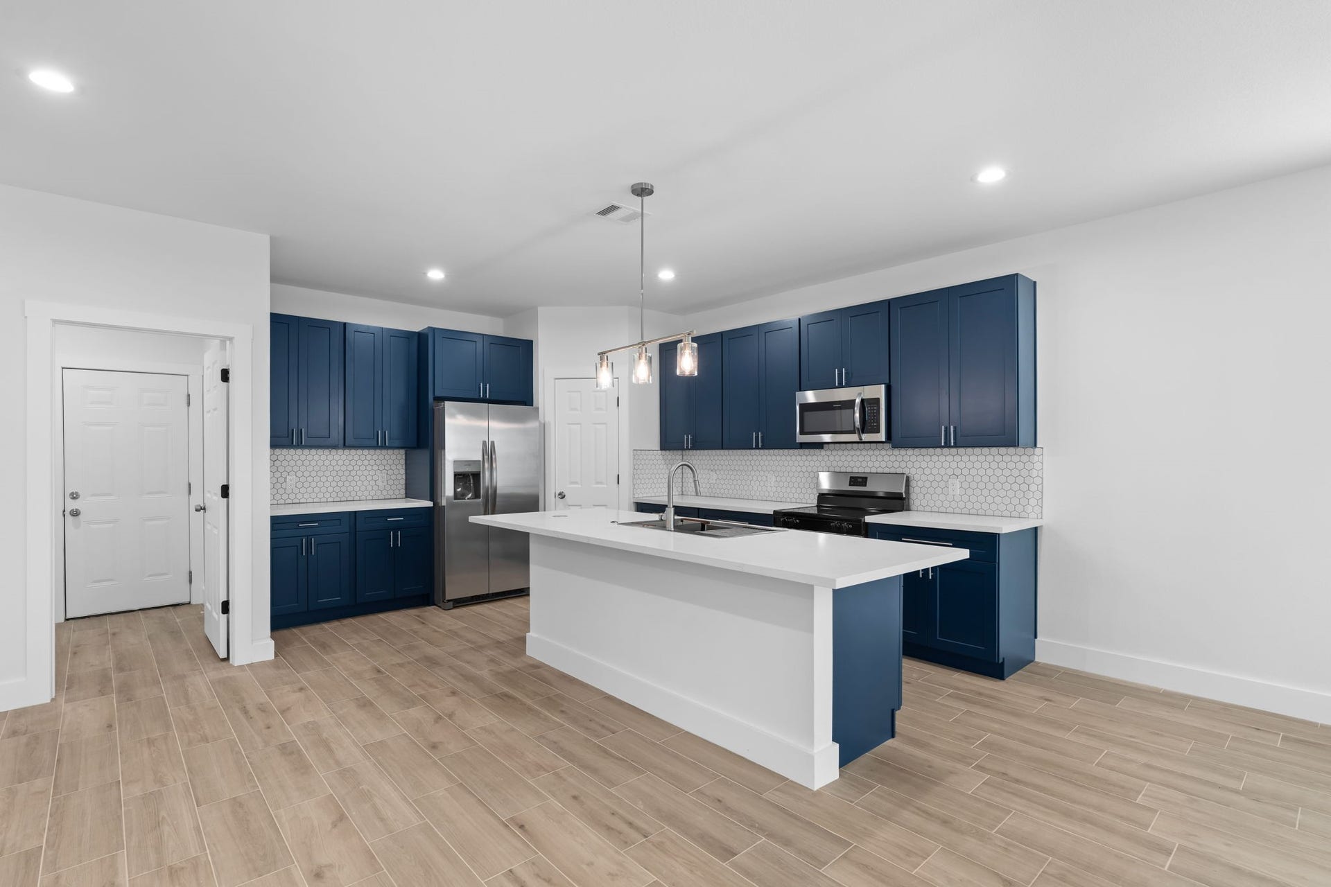 1303 Hawthorne Street, Baytown, TX 77520 Kitchen with pendant lighting and plenty of cabinet space