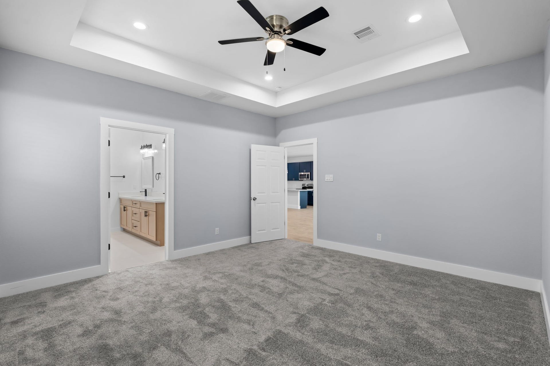 1303 Hawthorne Street, Baytown, TX 77520 The primary suite opens to a private bath