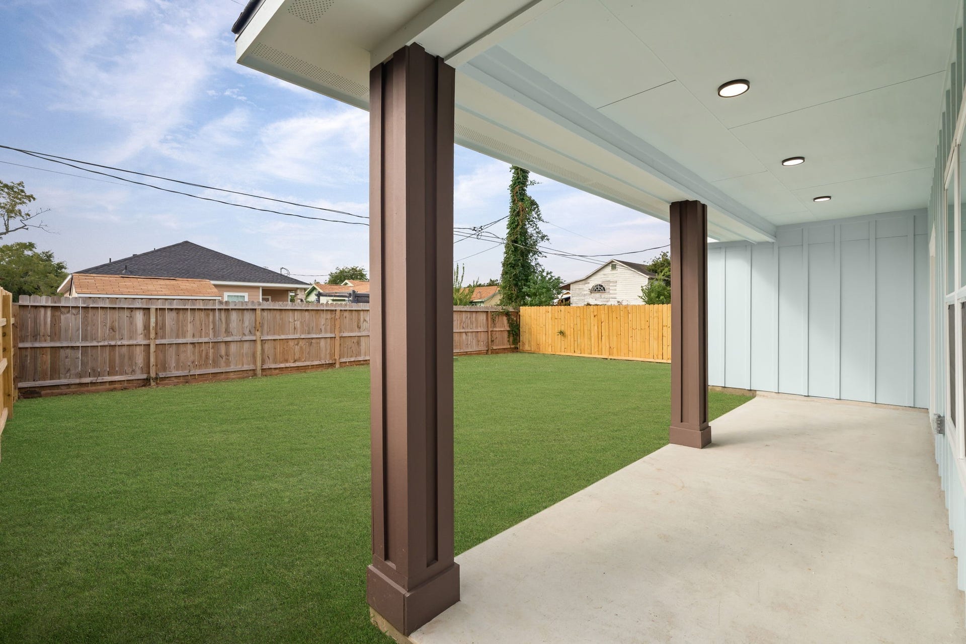 1303 Hawthorne Street, Baytown, TX 77520 Covered back patio, perfect for relaxing or grilling