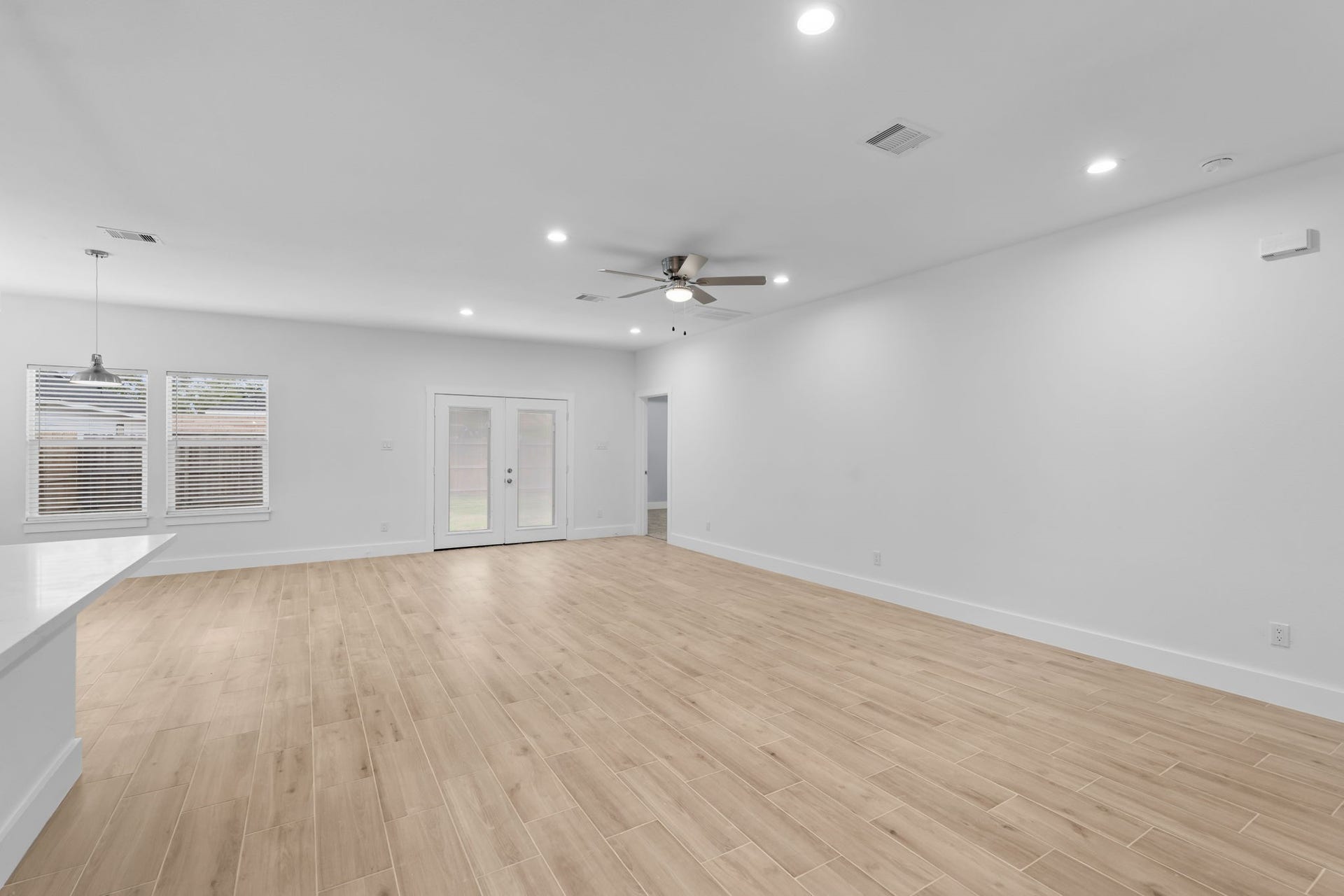 1303 Hawthorne Street, Baytown, TX 77520 French doors lead out to the covered back patio