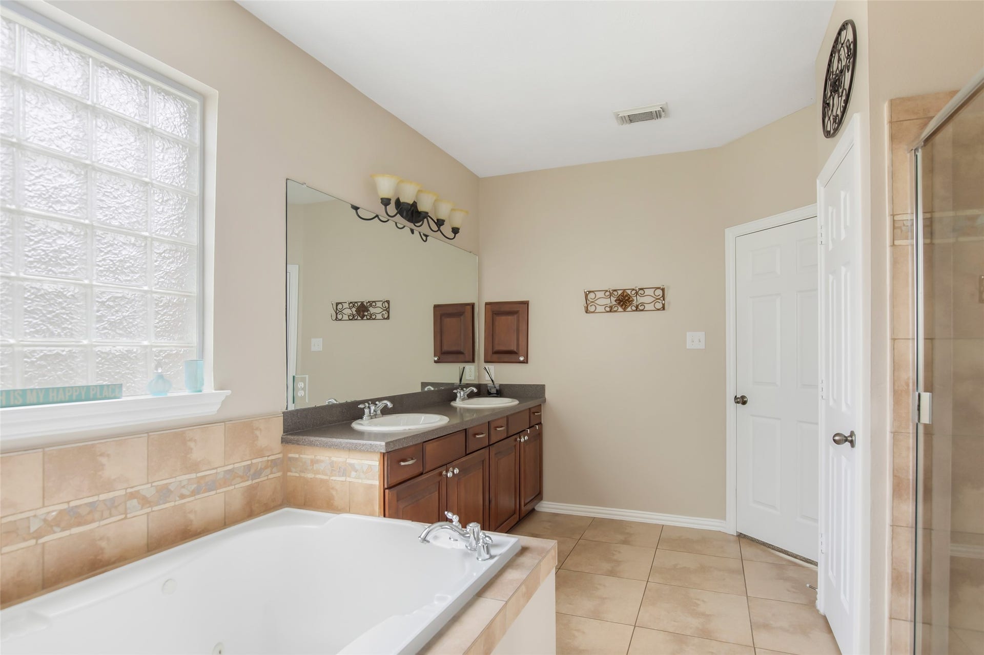 14422 Country Haven Court, Houston, TX 77044 Generously sized primary bathroom with separate tub and shower area