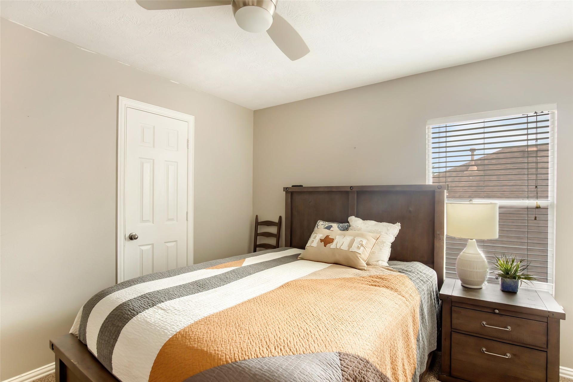 14422 Country Haven Court, Houston, TX 77044 Secondary bedroom with neutral finishes and natural light