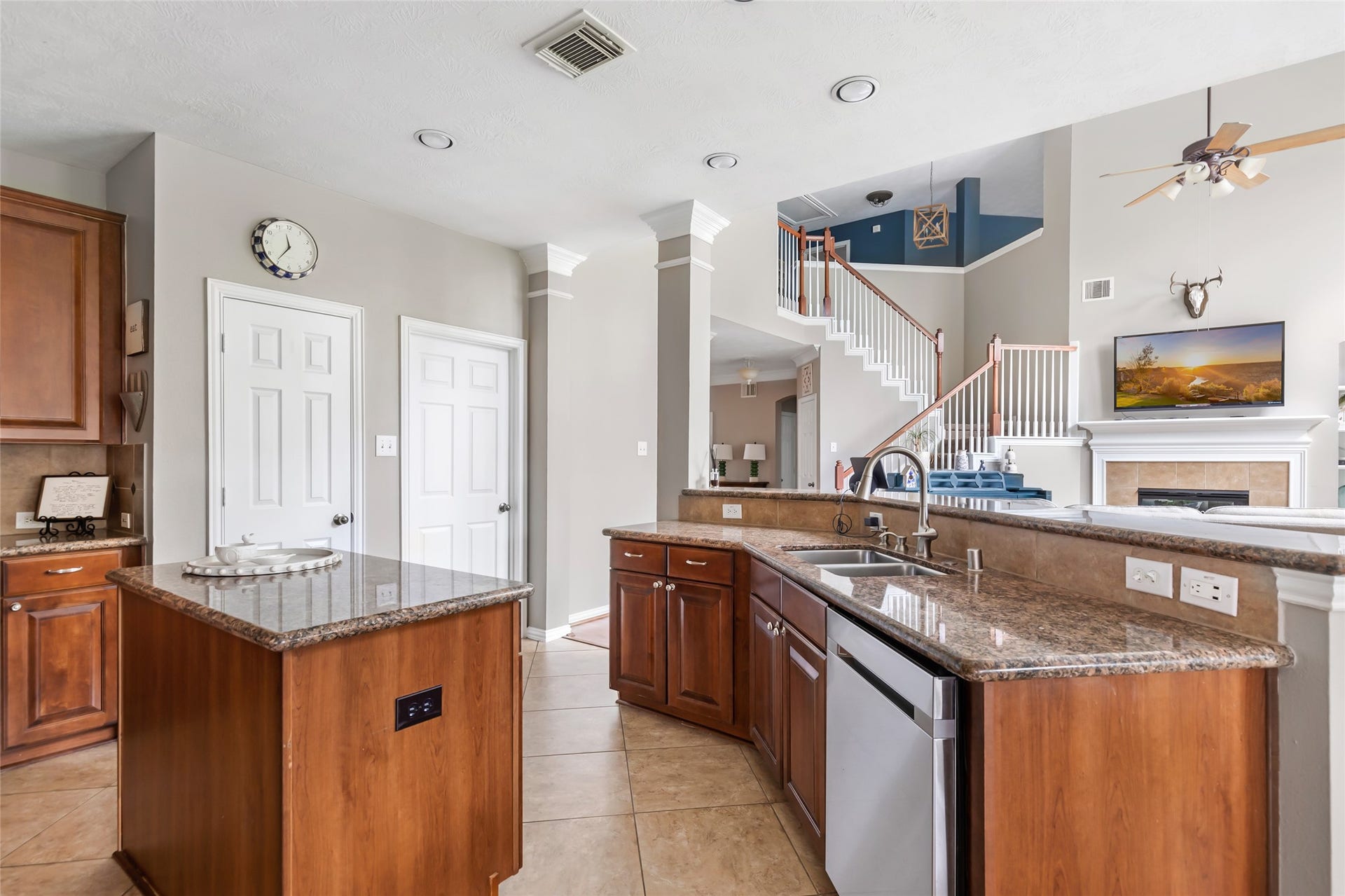 14422 Country Haven Court, Houston, TX 77044 Kitchen island and breakfast bar provide additional prep space and casual seating