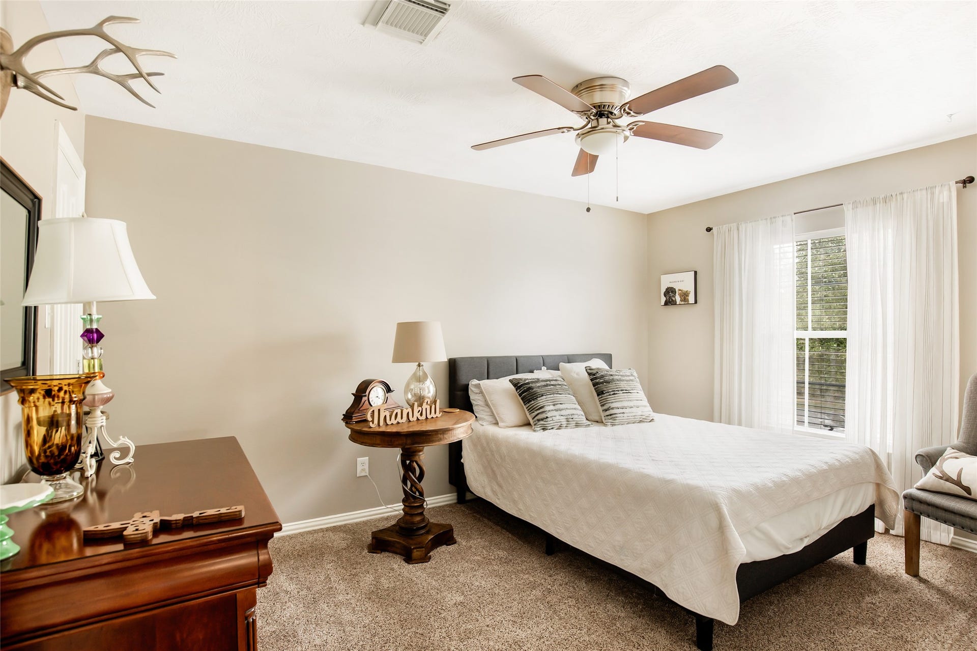 14422 Country Haven Court, Houston, TX 77044 Secondary bedroom with neutral finishes and ceiling fan